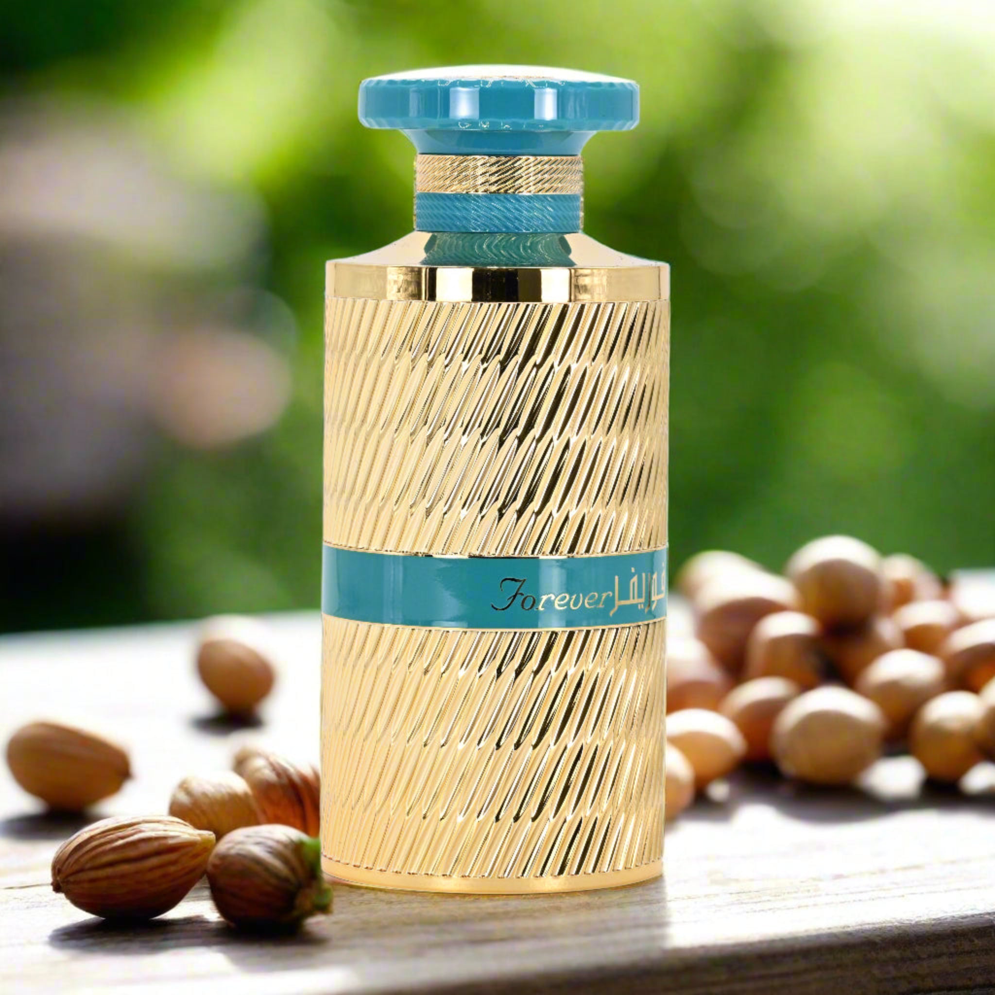 Perfume bottle with a blue cap and band, surrounded by almonds on a wooden surface.
