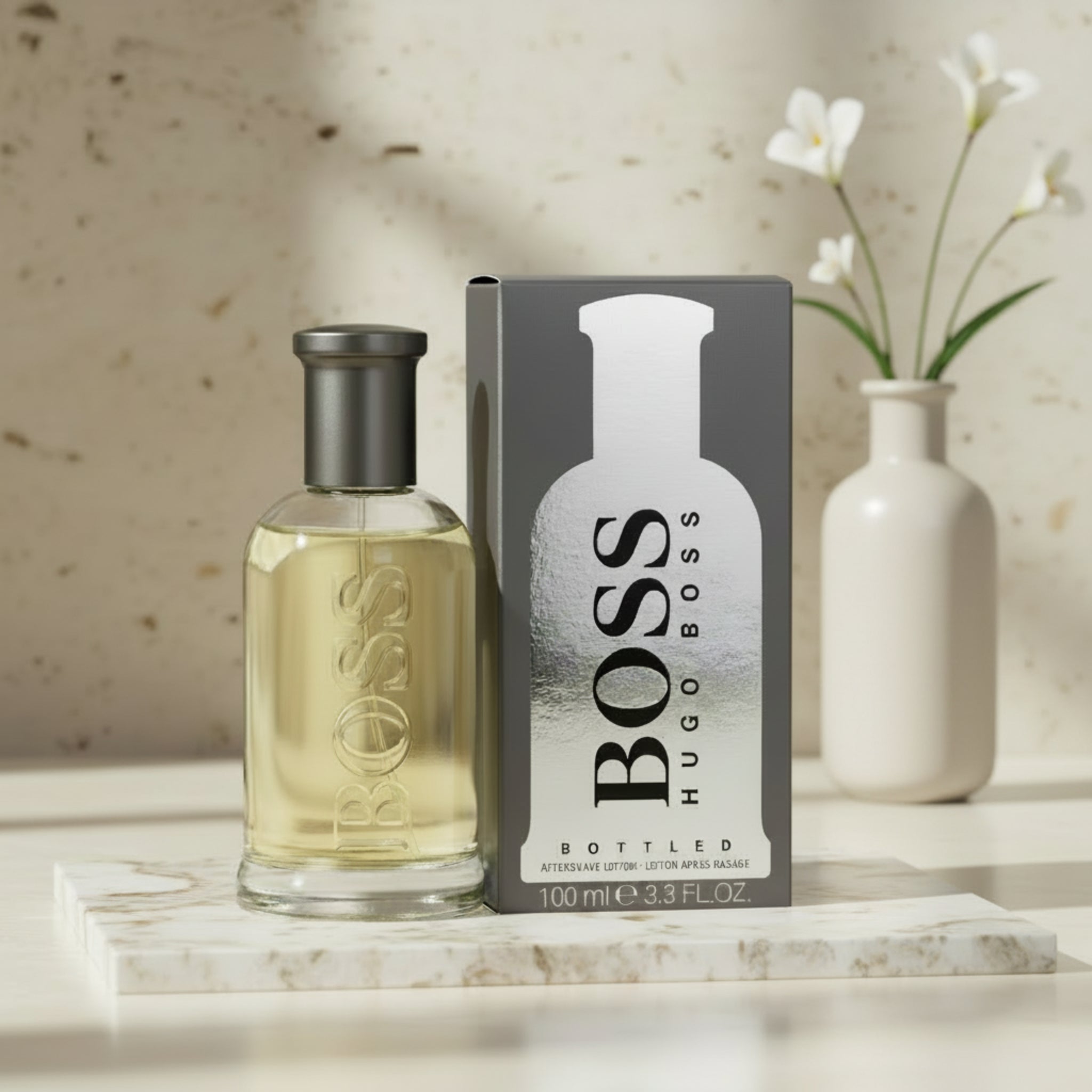 BOSS Hugo Boss aftershave lotion bottle and packaging on a white background