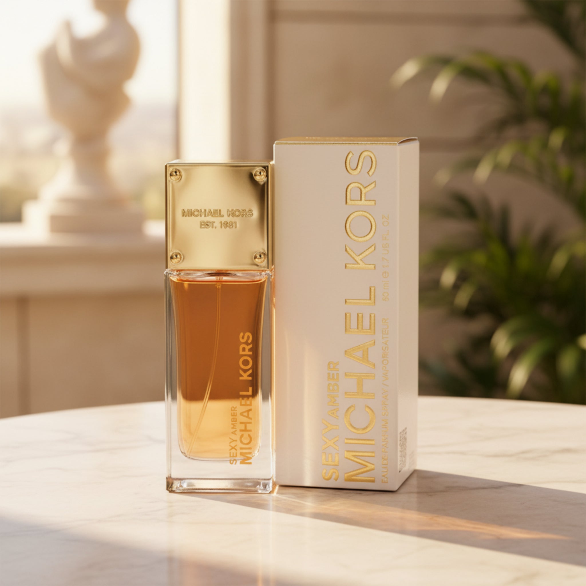 Michael Kors Sexy Amber perfume bottle and packaging on a white background