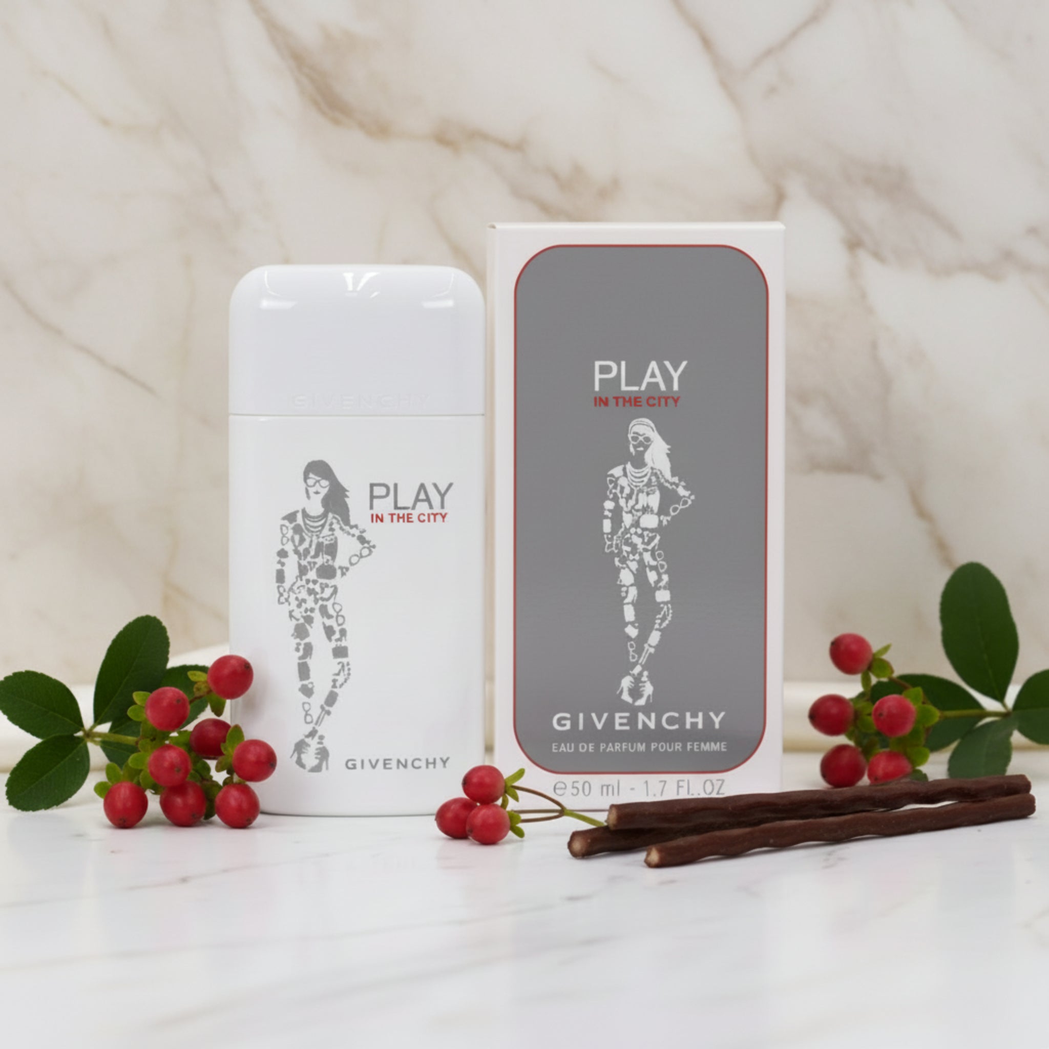 Givenchy 'Play in the City' perfume bottle and packaging on a white background