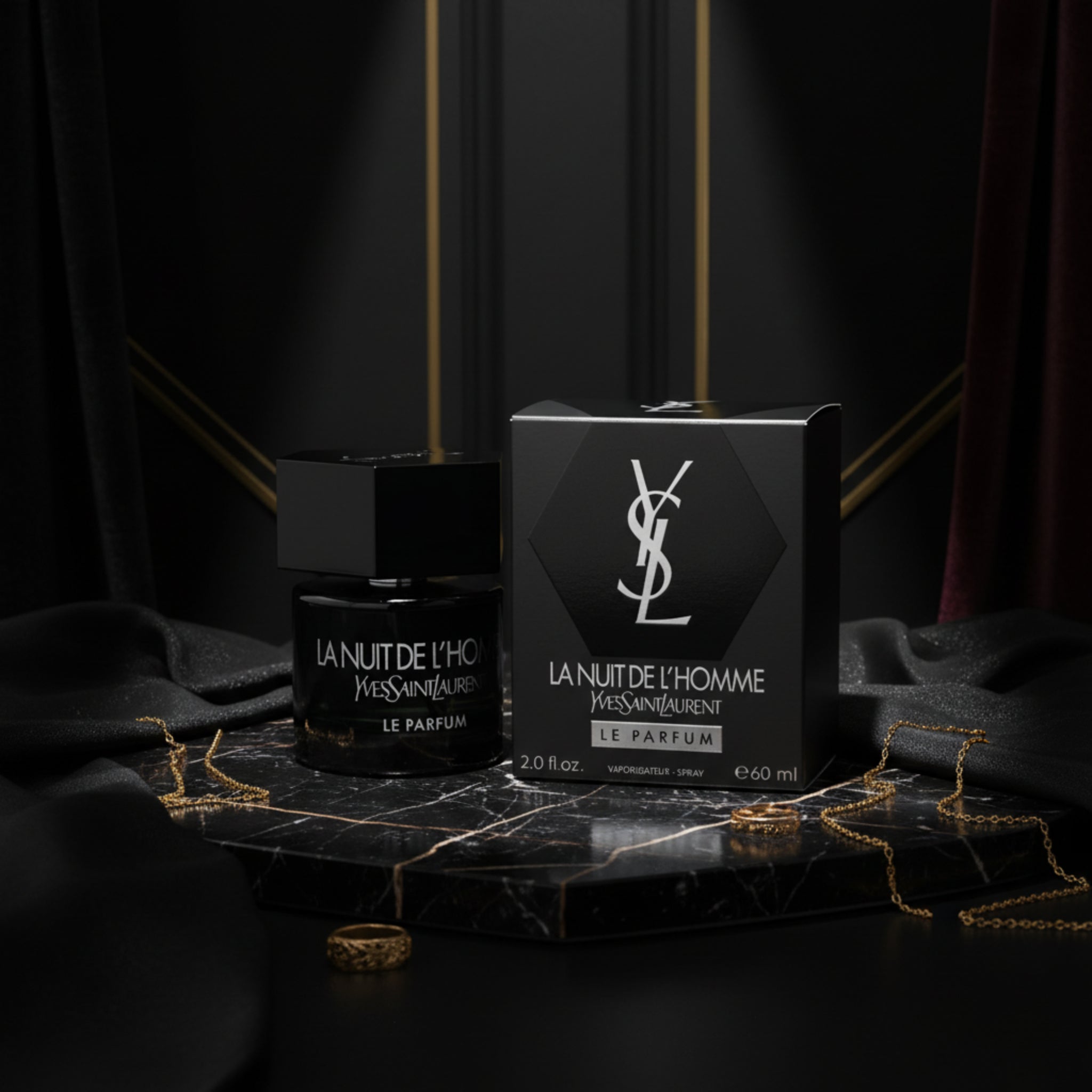 YSL La Nuit de L'Homme perfume bottle and packaging on a white background