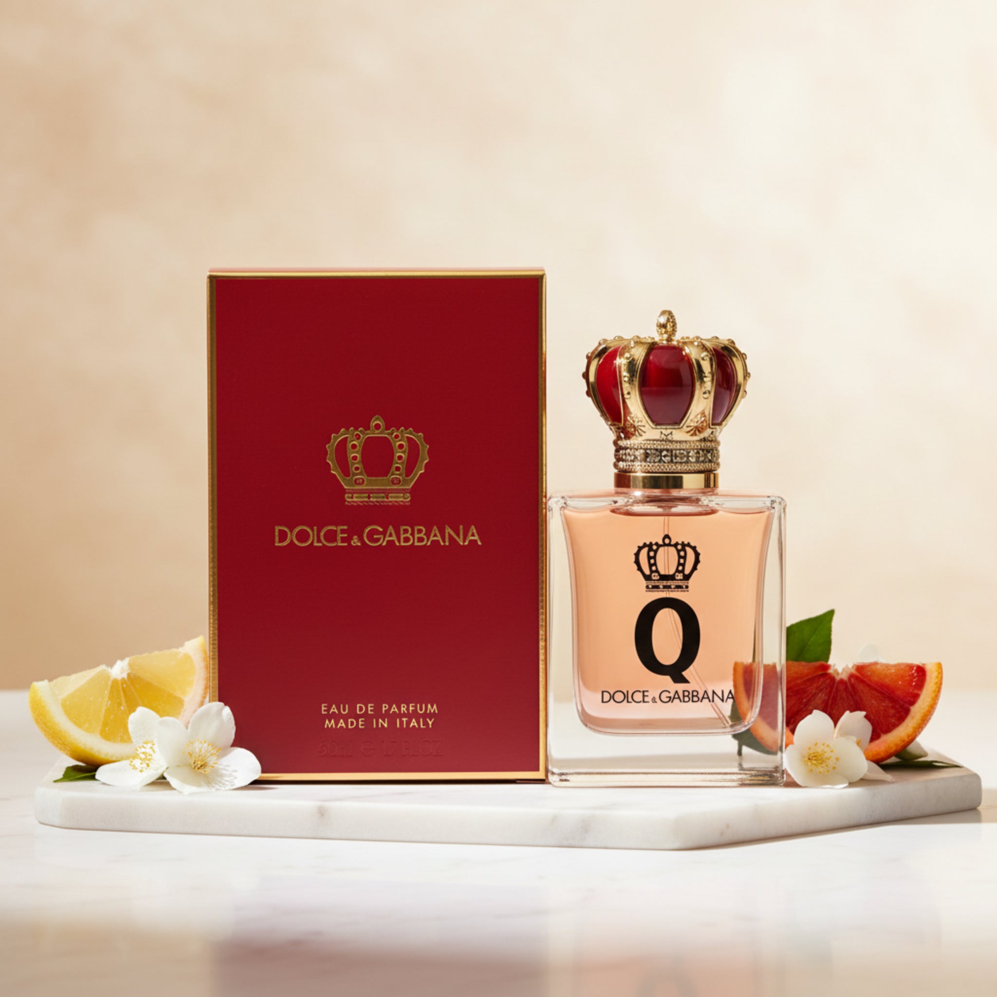 Dolce & Gabbana perfume bottle with red box on a white background
