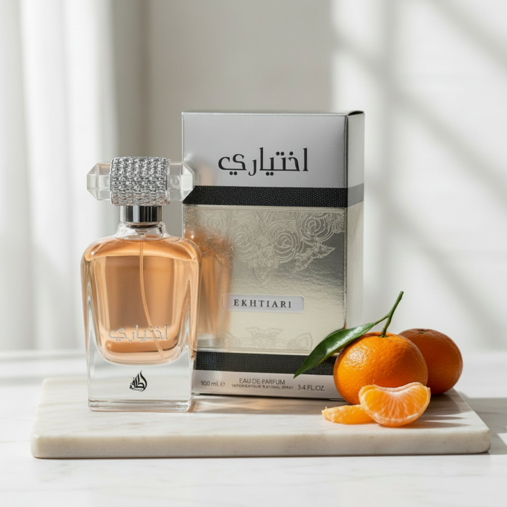 Perfume bottle and packaging of Ekhtiari on a white background