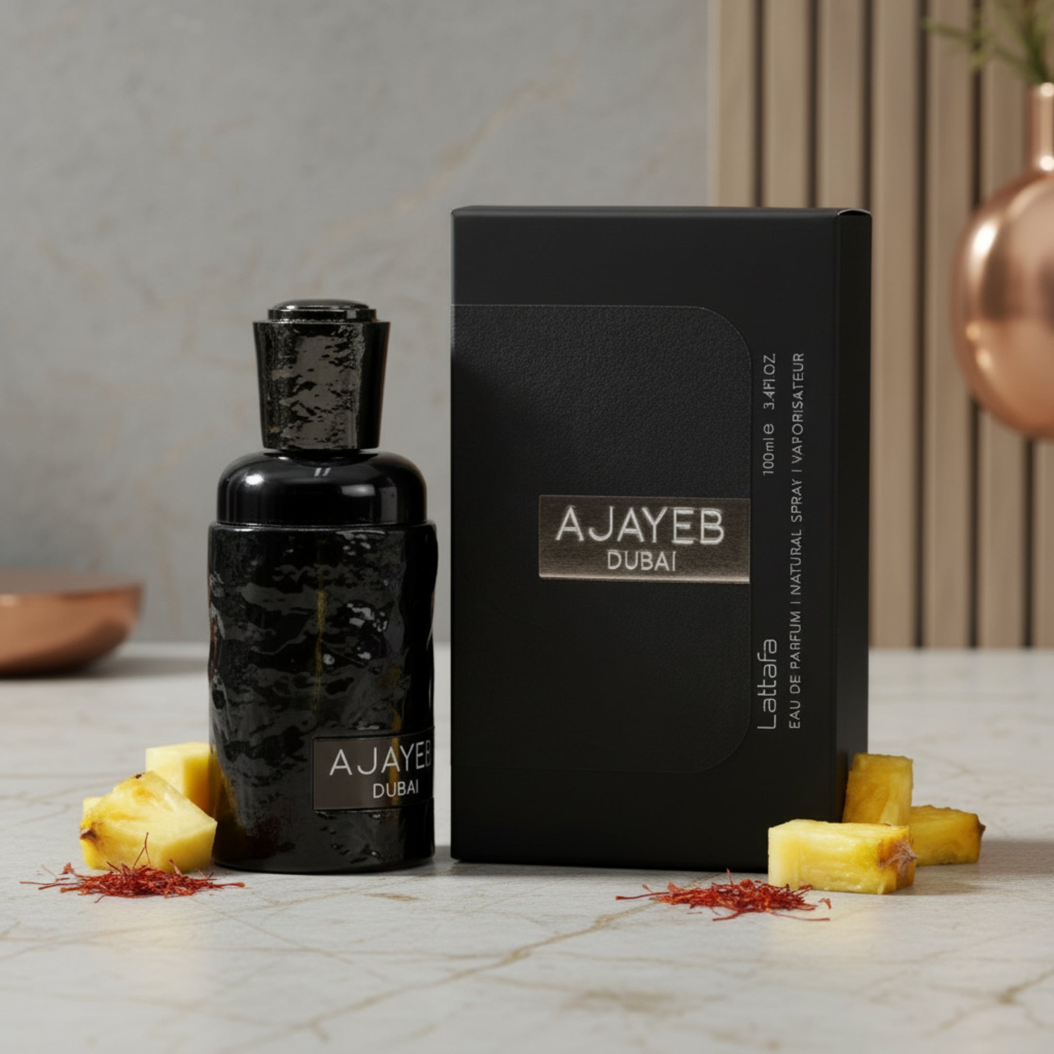 Black Ajayeb Dubai perfume bottle and packaging on a white background