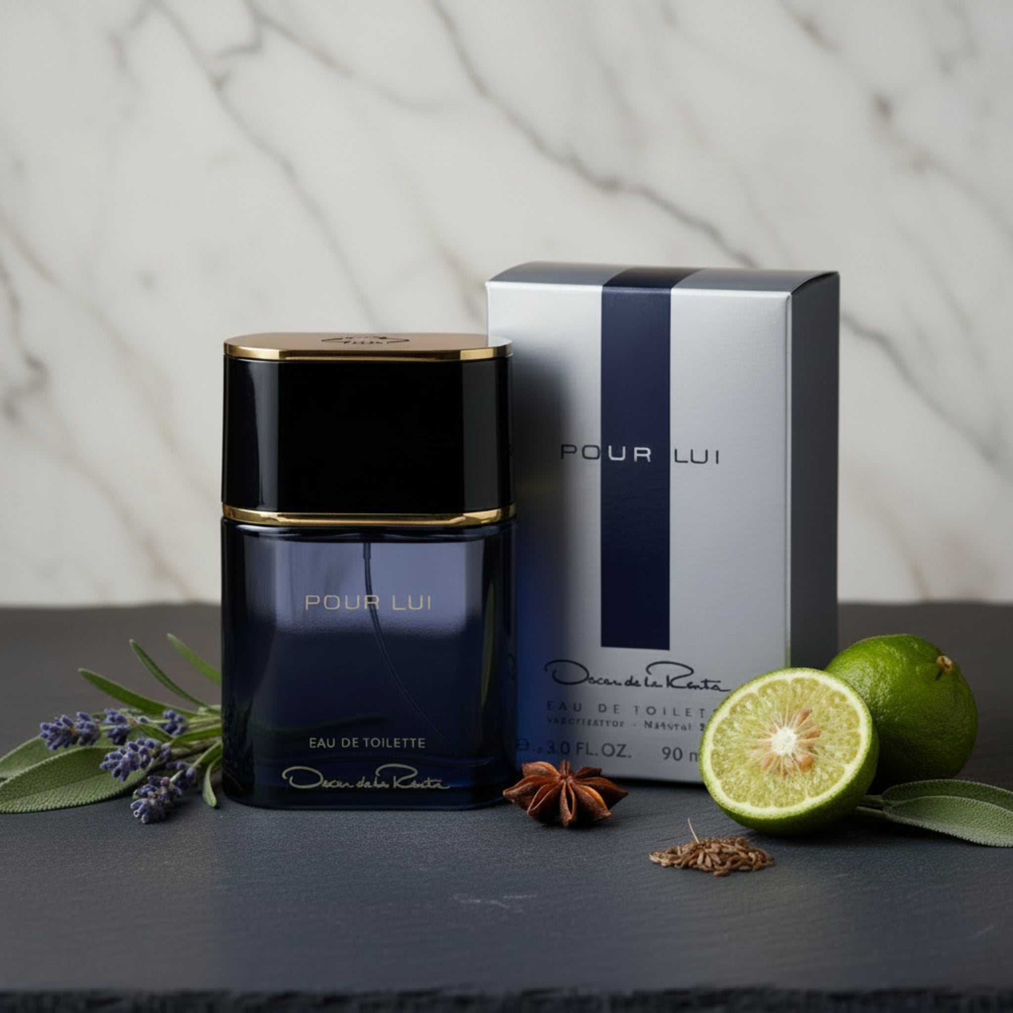 Oscar de la Renta Pour Lui Eau de Toilette bottle and packaging on a white background