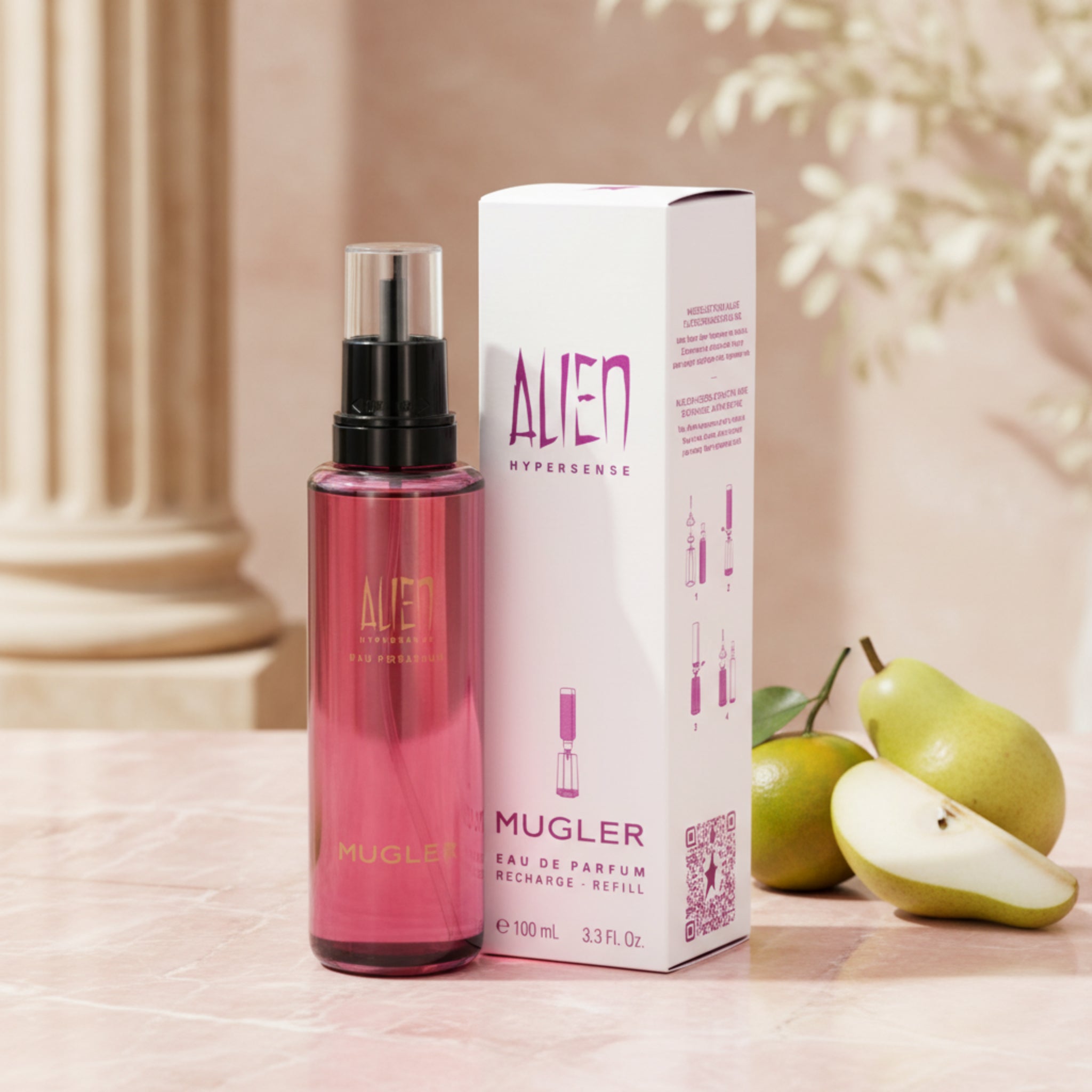 Mugler Alien perfume bottle and packaging on a white background