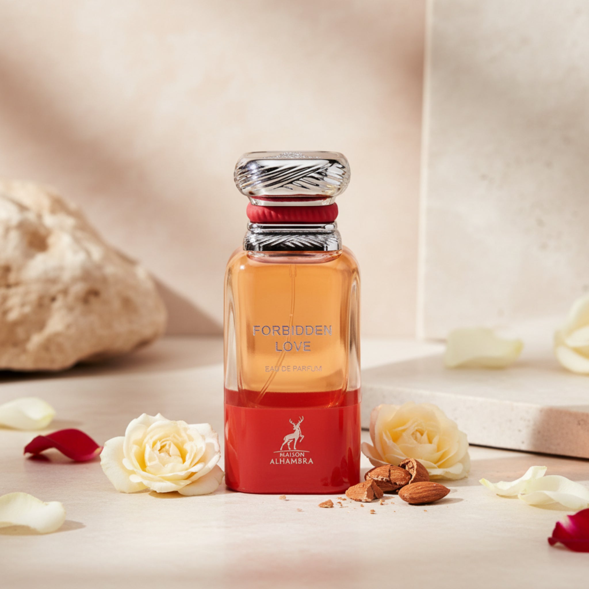 Perfume bottle labeled 'Forbidden Love' by Maison Alhambra on a white background
