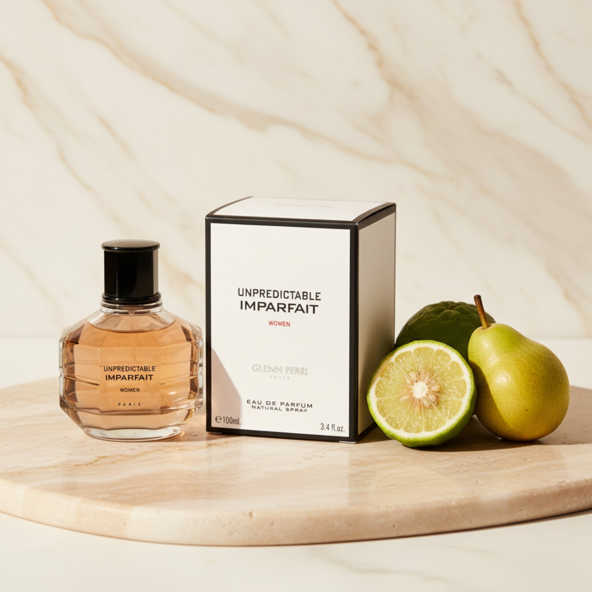 Perfume bottle and packaging of 'Unpredictable Imparfait' on a white background