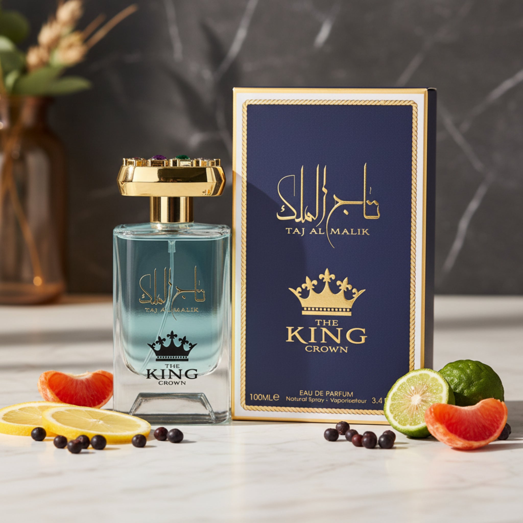 Perfume bottle and packaging of 'Taj Al Malik The King Crown' on a white background