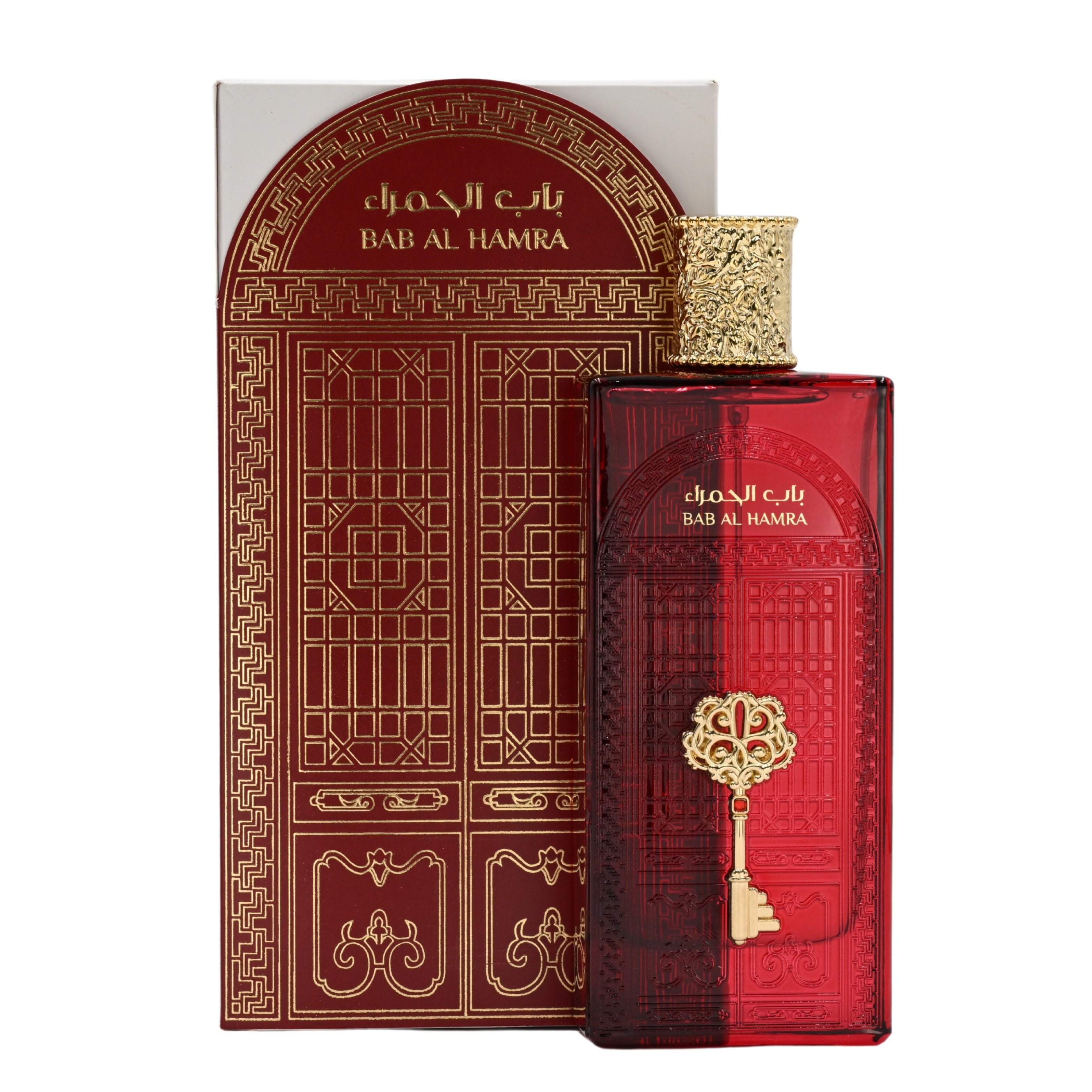 Red perfume bottle with gold accents and decorative packaging on a white background