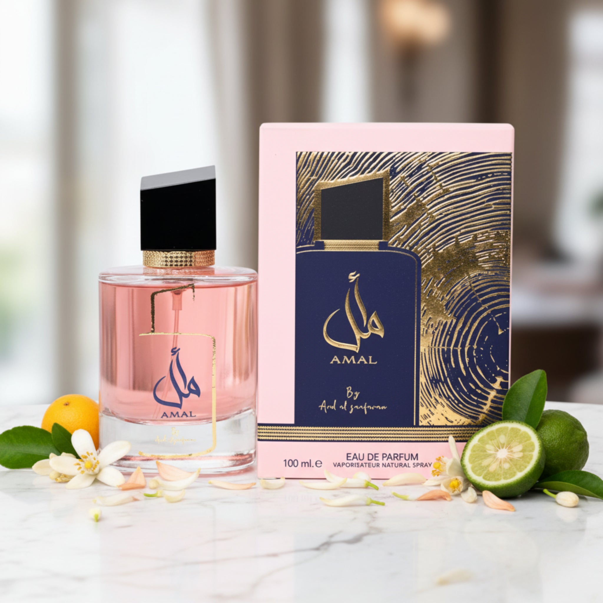 Amal perfume bottle and packaging on a white background