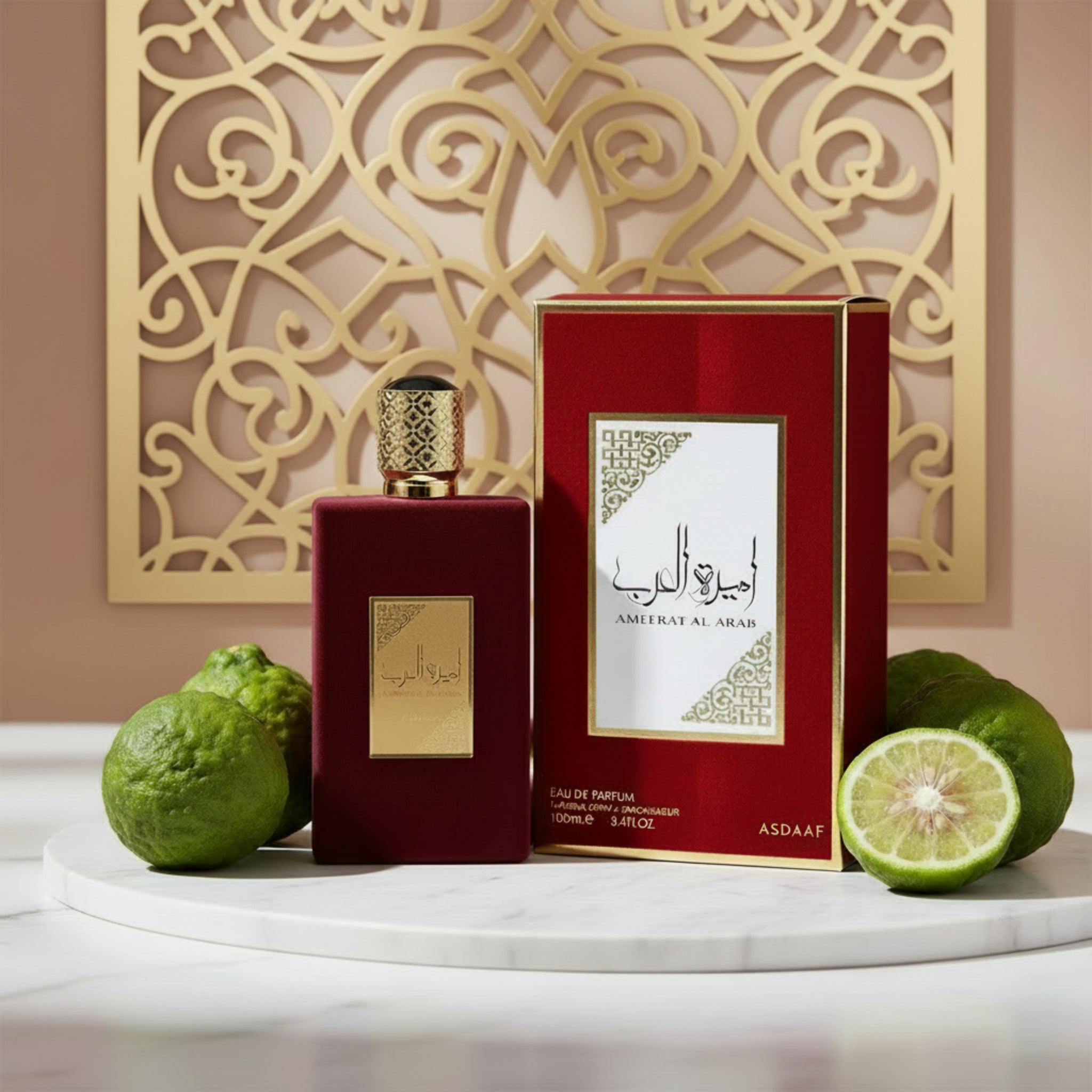 Perfume bottle and packaging with gold accents on a white background