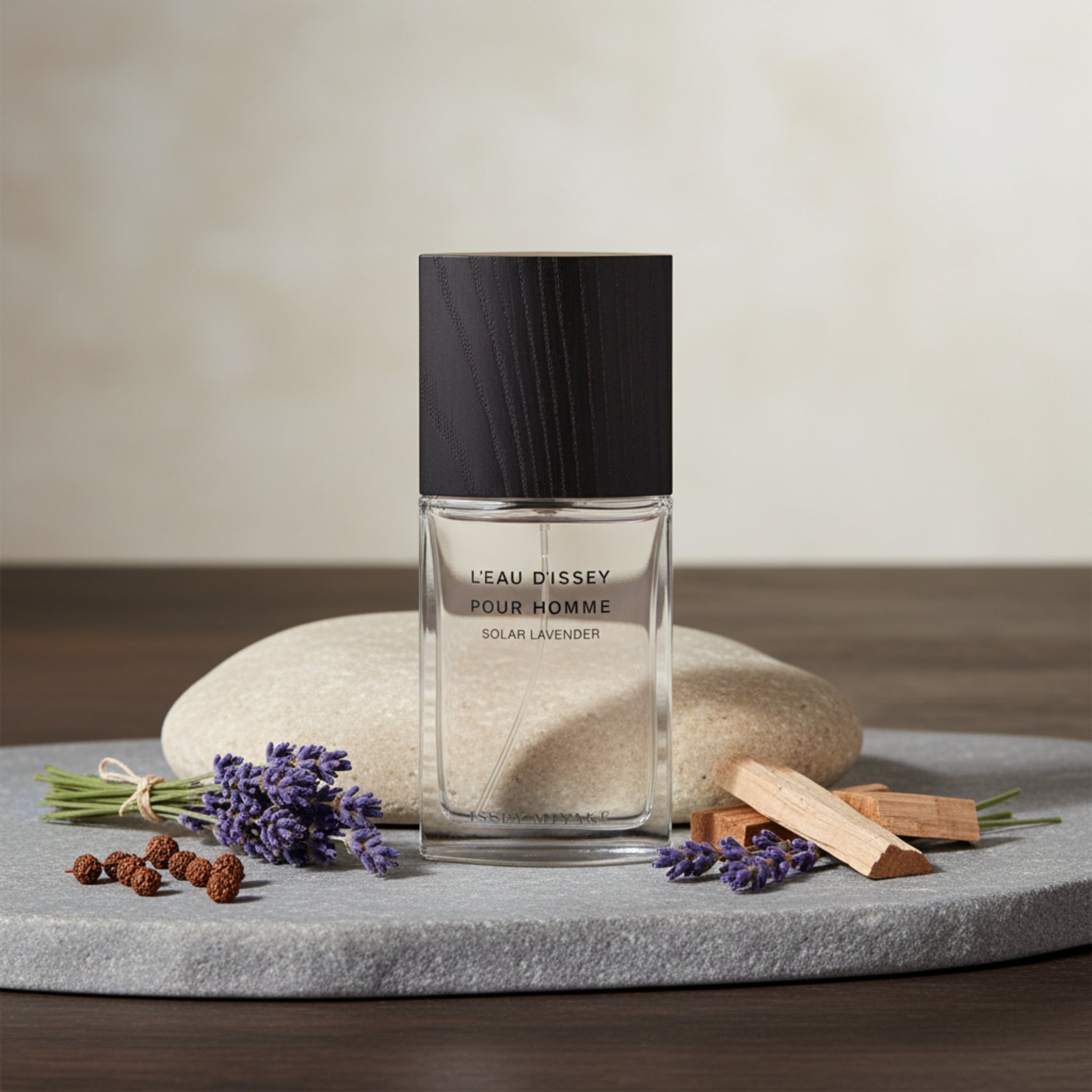 Perfume bottle labeled 'Léau Dissey Pour Homme' by Issey Miyake on a white background