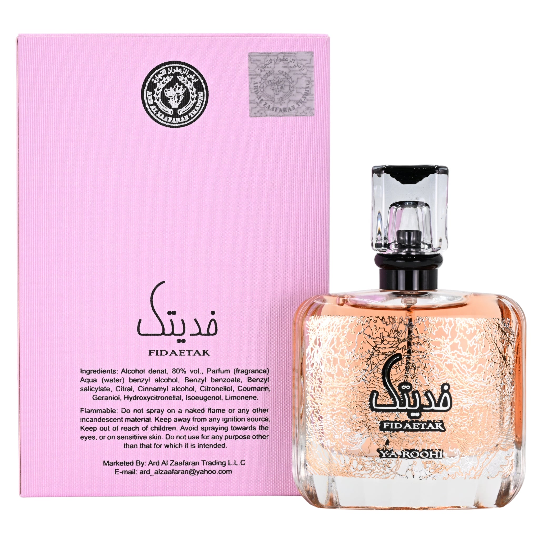 Fidaetak perfume bottle with pink packaging on a white background