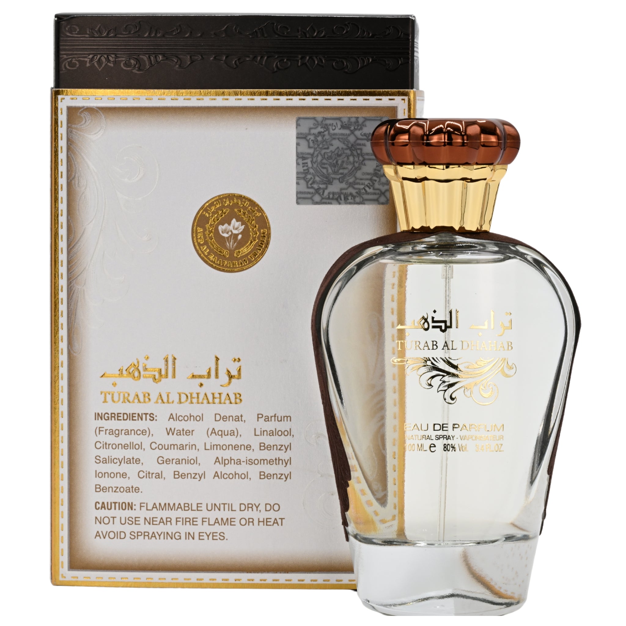 Turab Al Dhahab perfume bottle with packaging on a white background