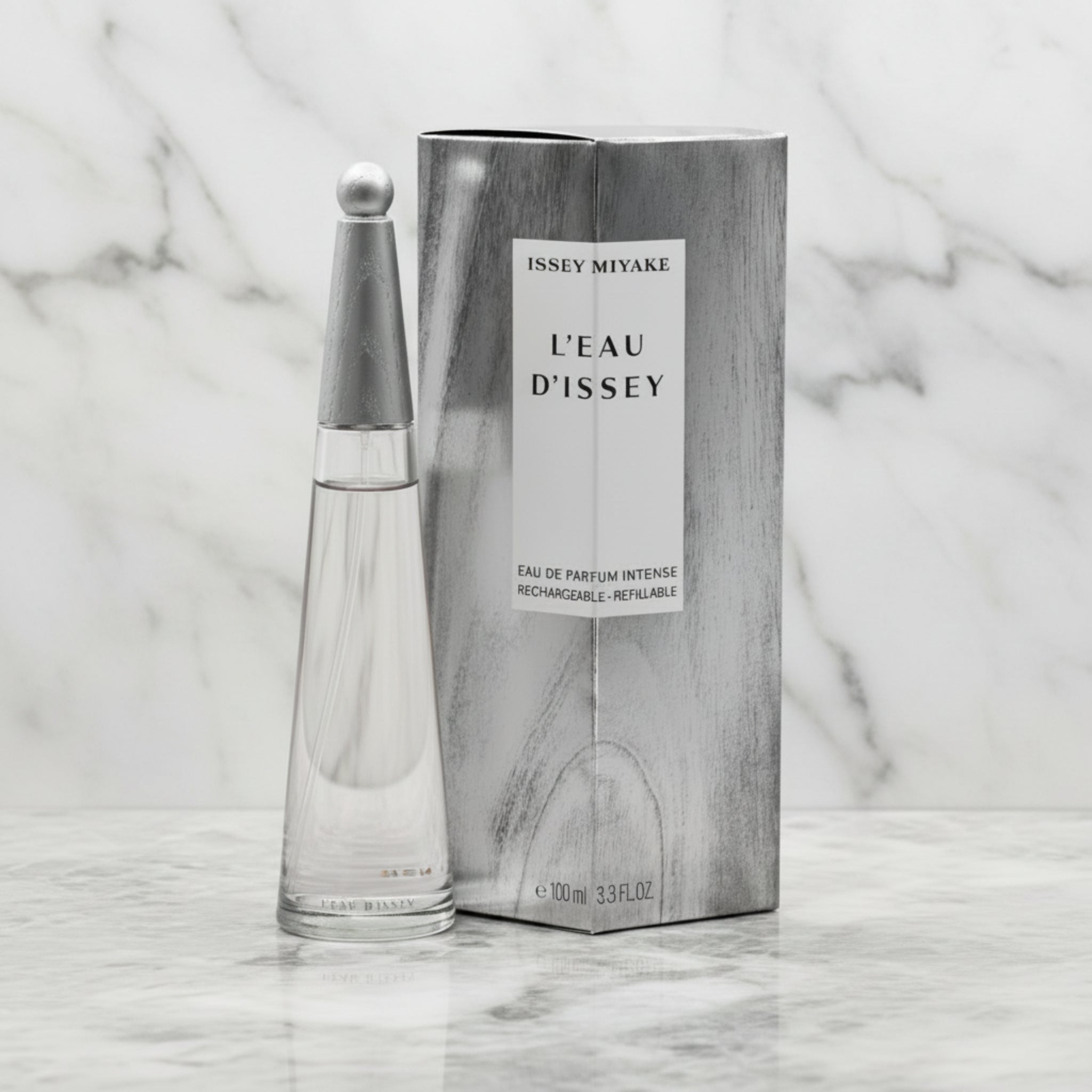Issey Miyake L'Eau d'Issey perfume bottle and packaging on a white background
