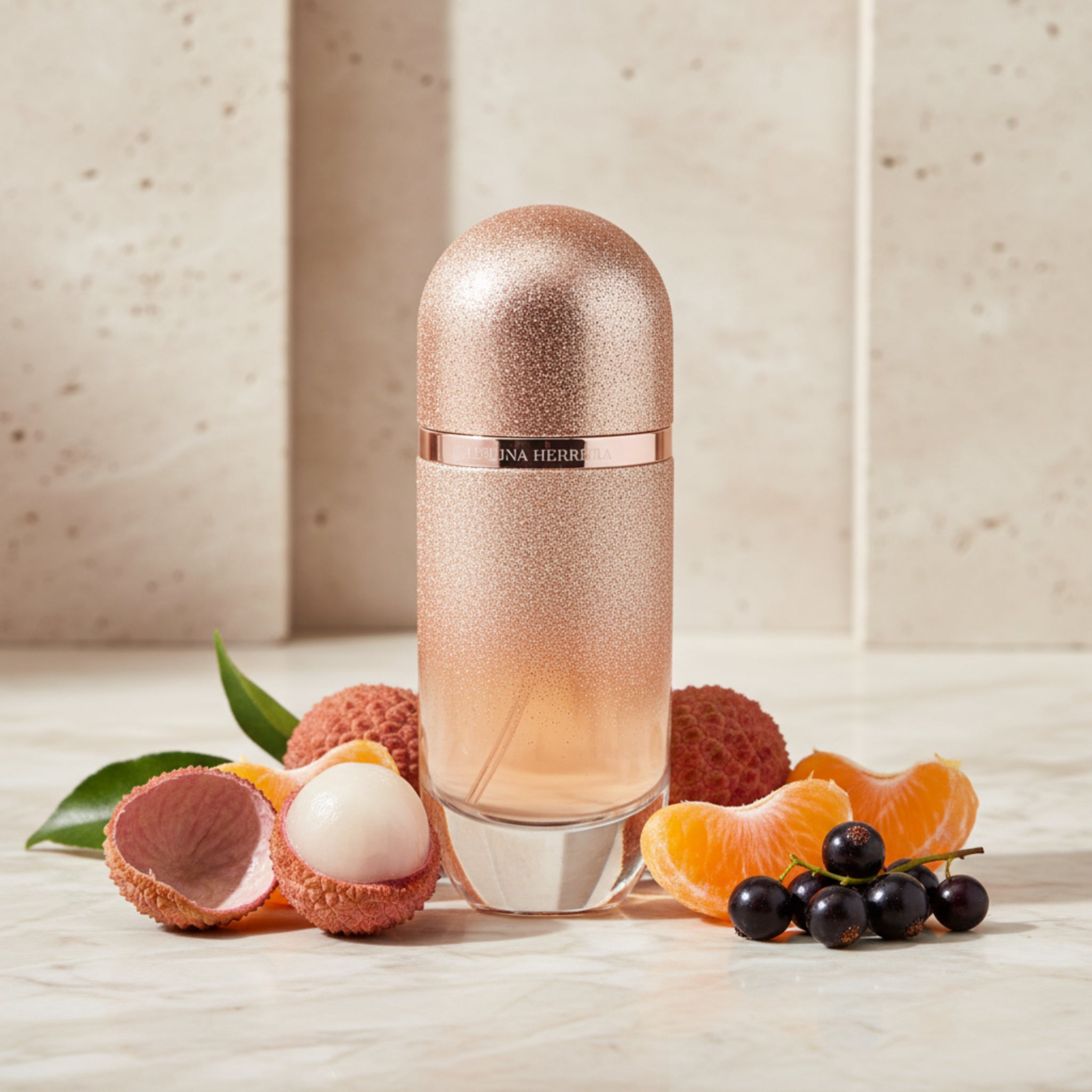 Gold glittery perfume bottle with 'A Hermes' branding on a white background