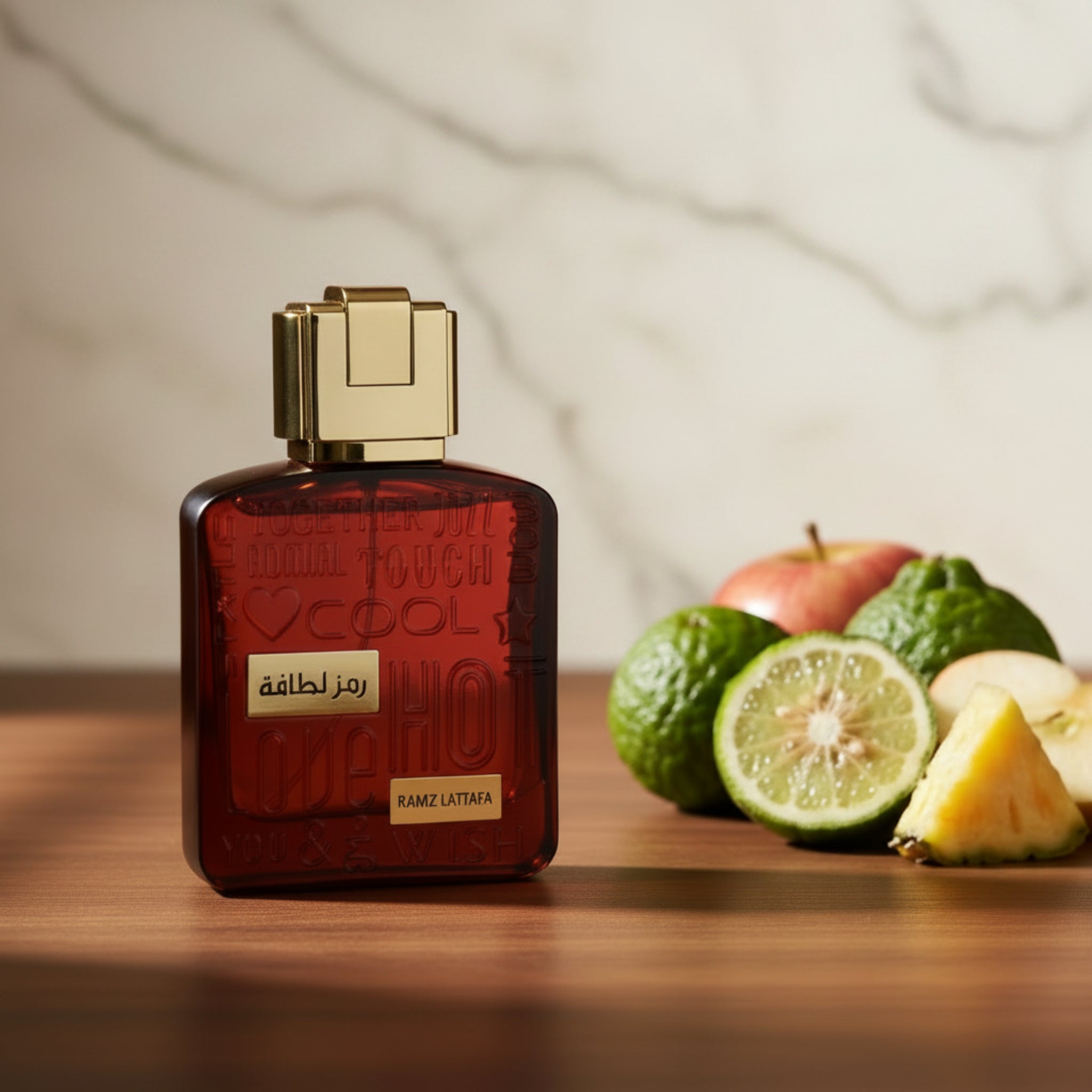 Red perfume bottle with gold cap on a white background