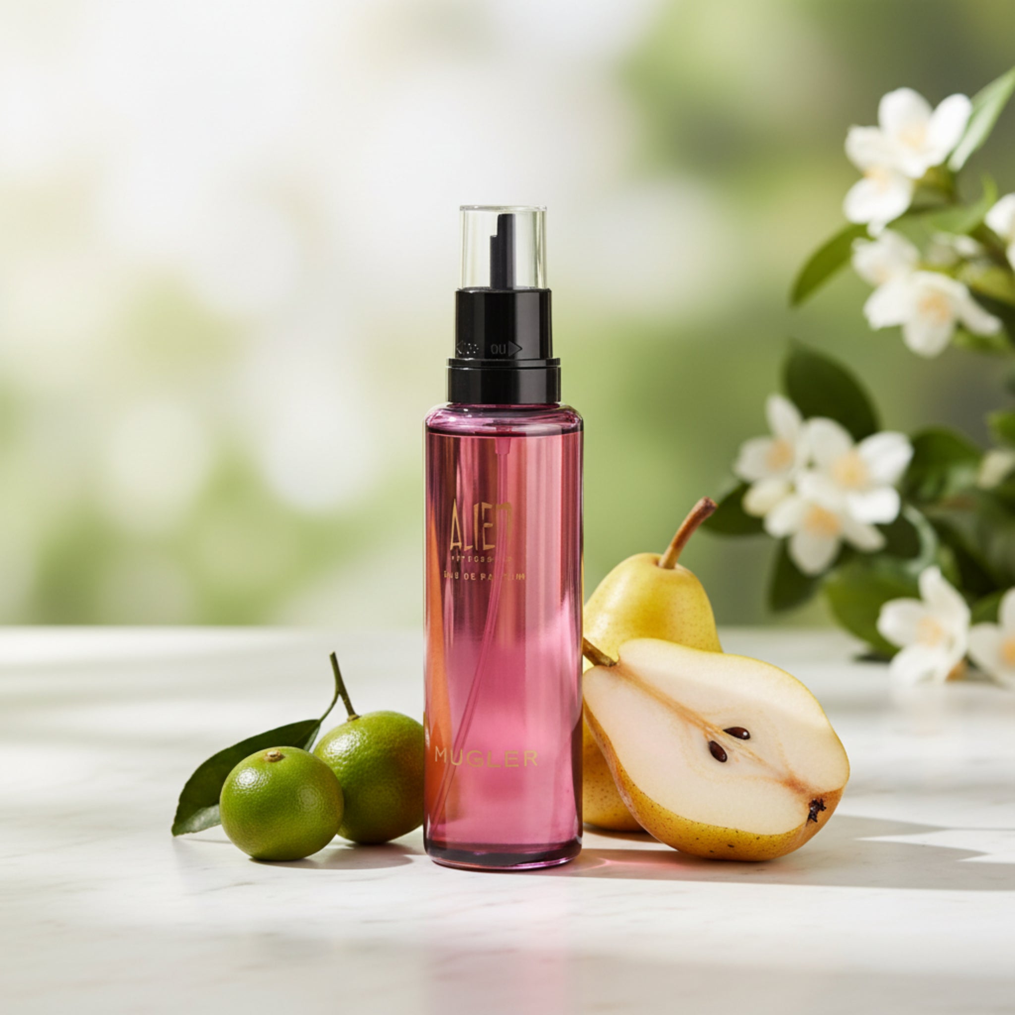 Pink spray bottle with black nozzle on a white background