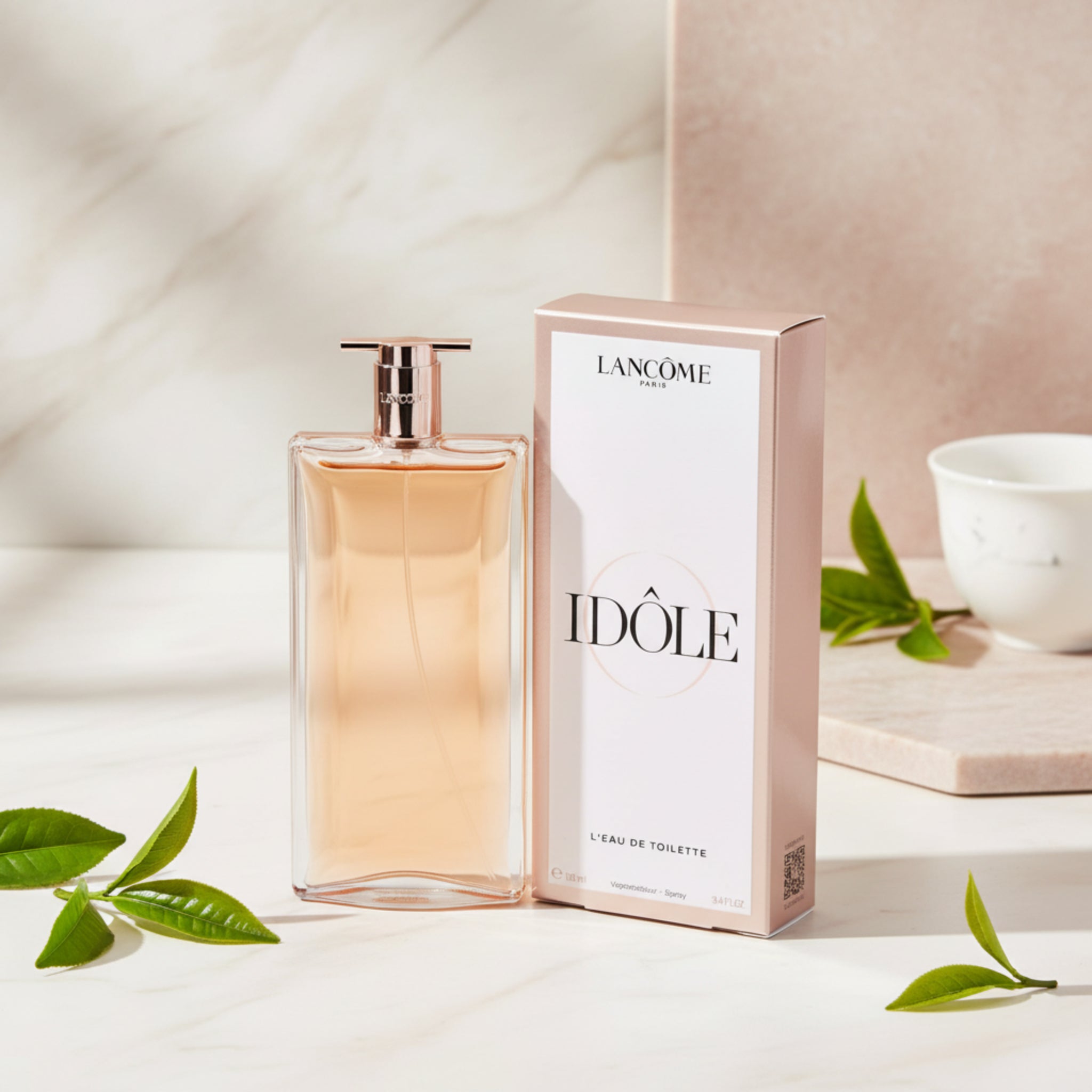 Lancome Idole perfume bottle and packaging on a white background
