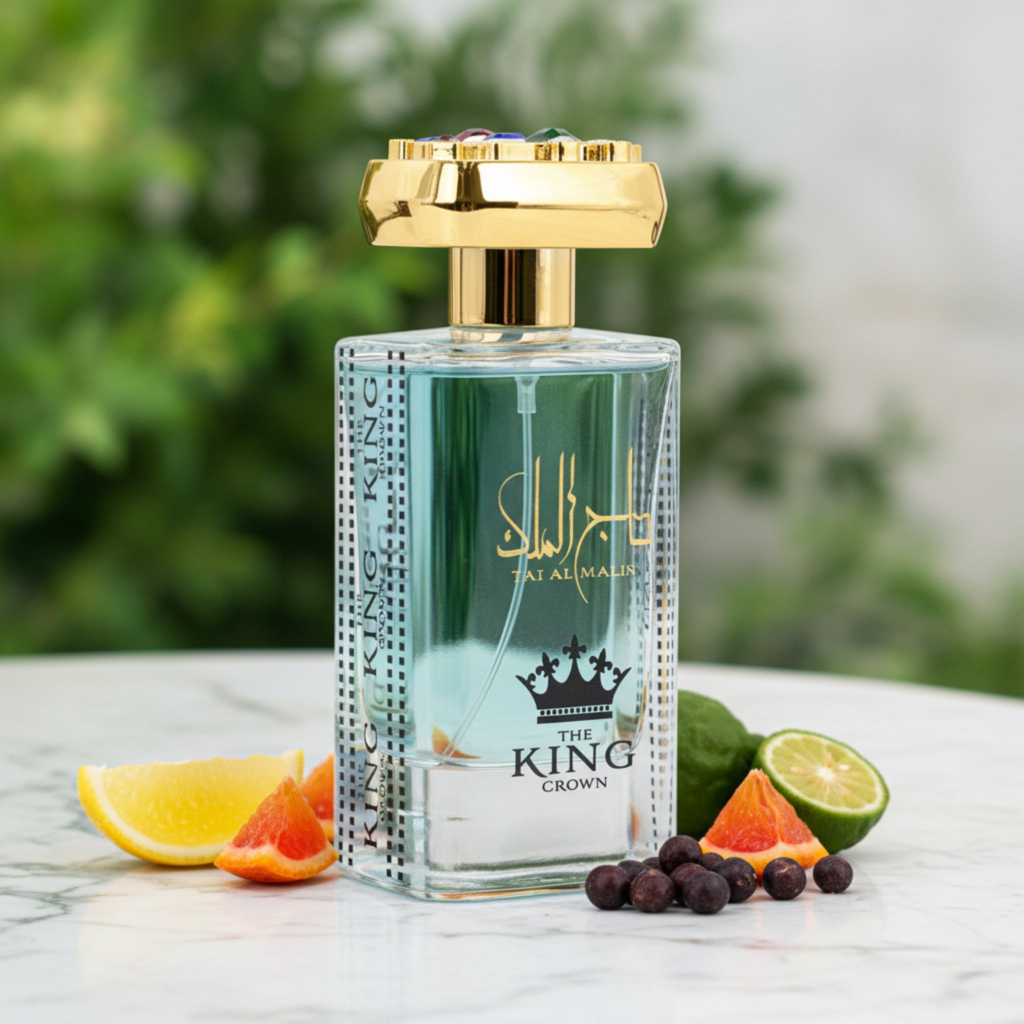 Perfume bottle with gold cap and 'King Crown' branding on a white background