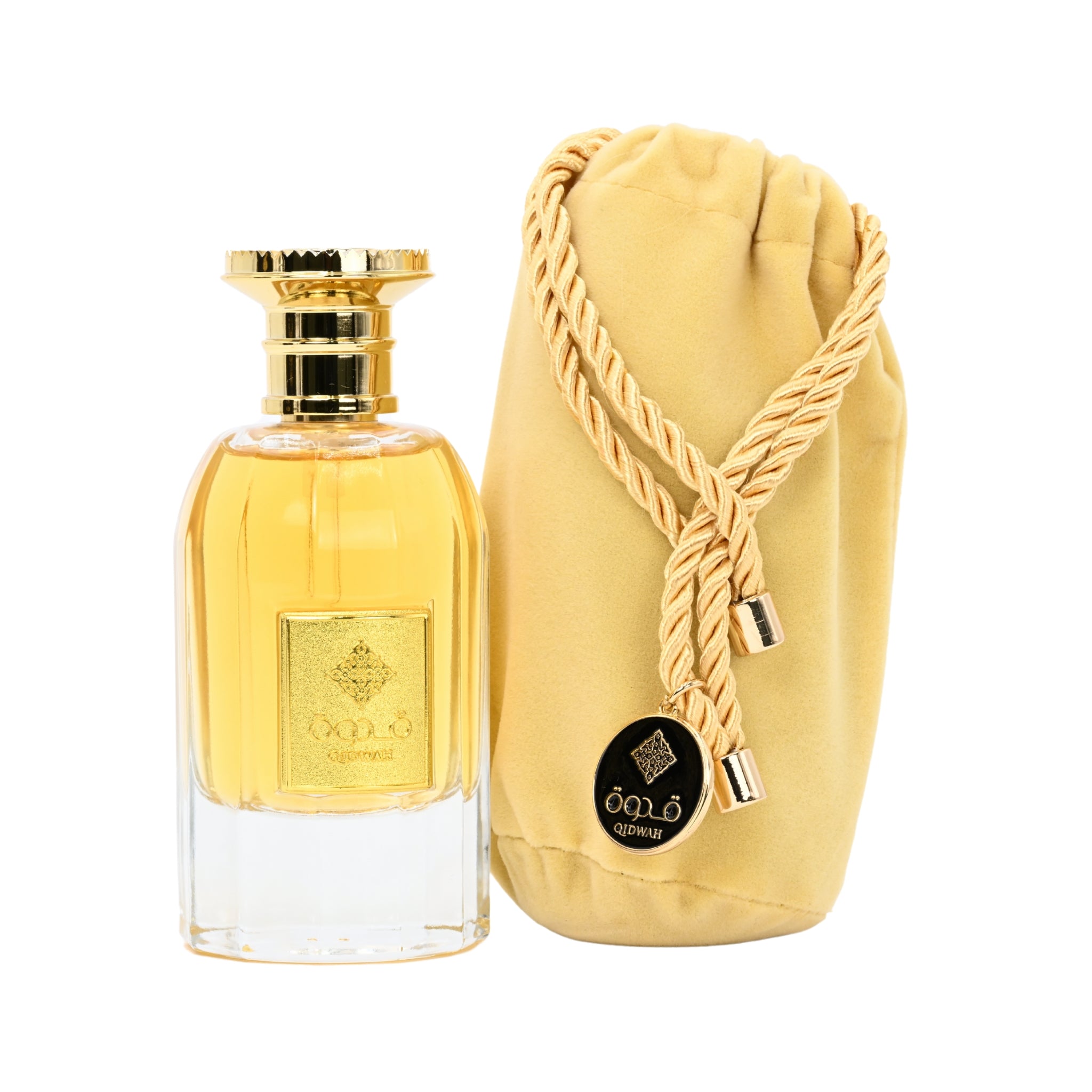 Perfume bottle with gold cap and packaging on a white background