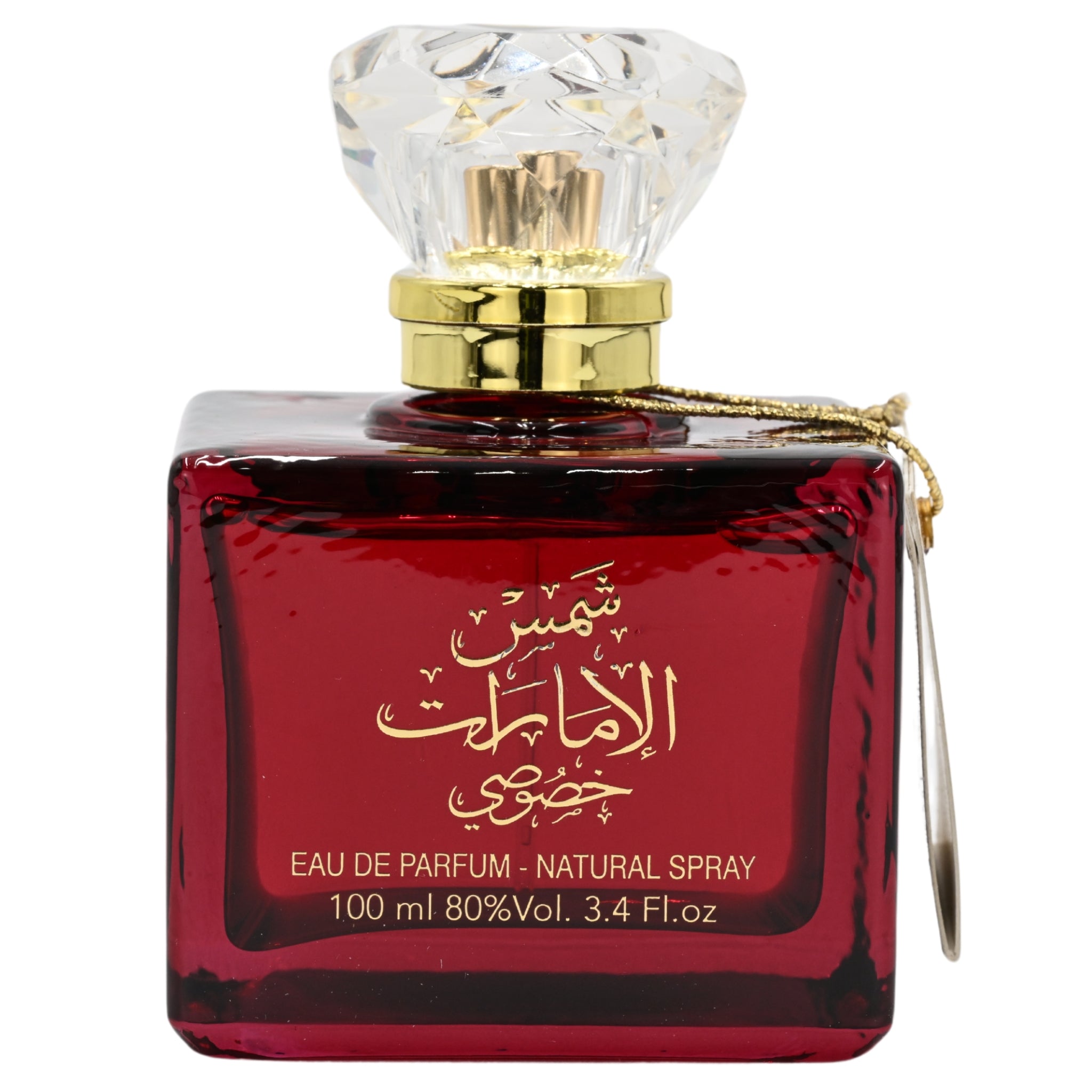 Red perfume bottle with gold cap on a white background