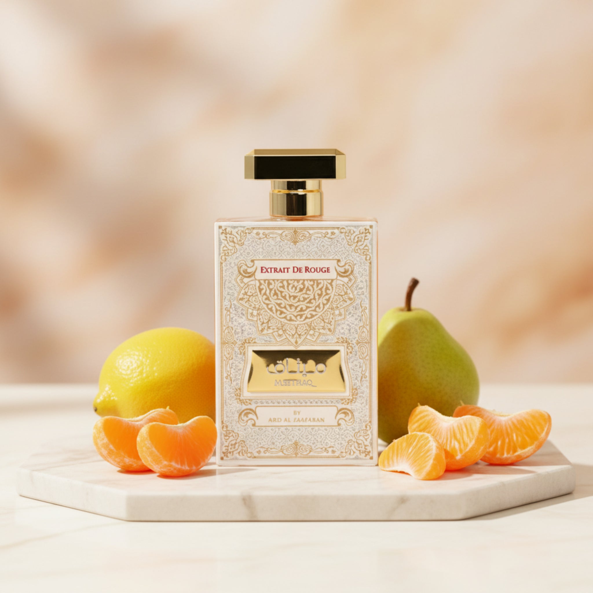Perfume bottle with gold cap and intricate design on a white background