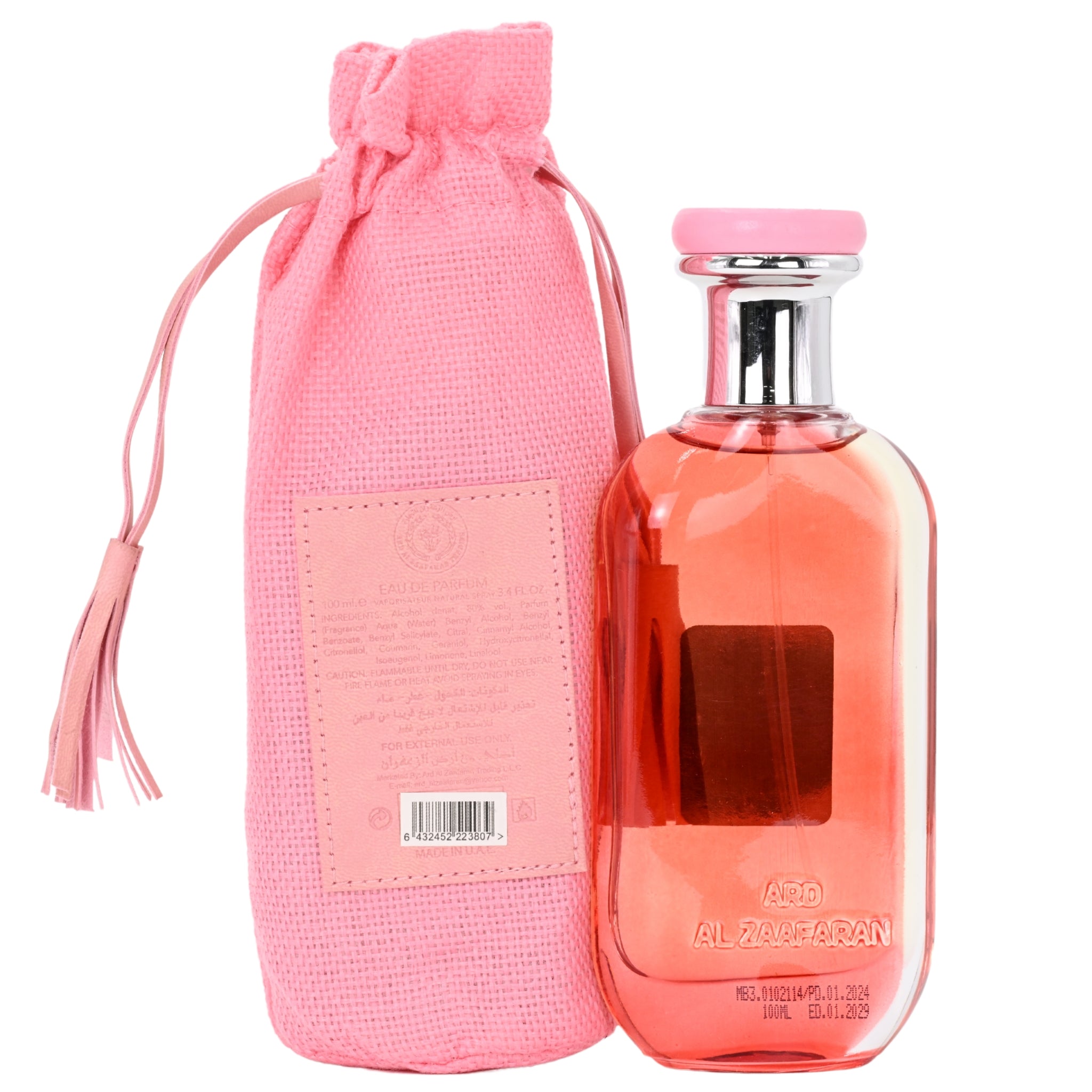 Pink bottle of alcohol with a matching pink drawstring bag on a white background