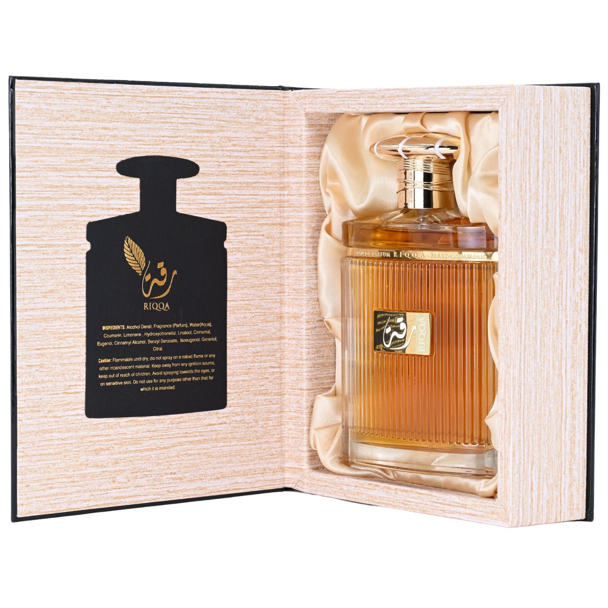 Perfume bottle with gold cap and label in a decorative box