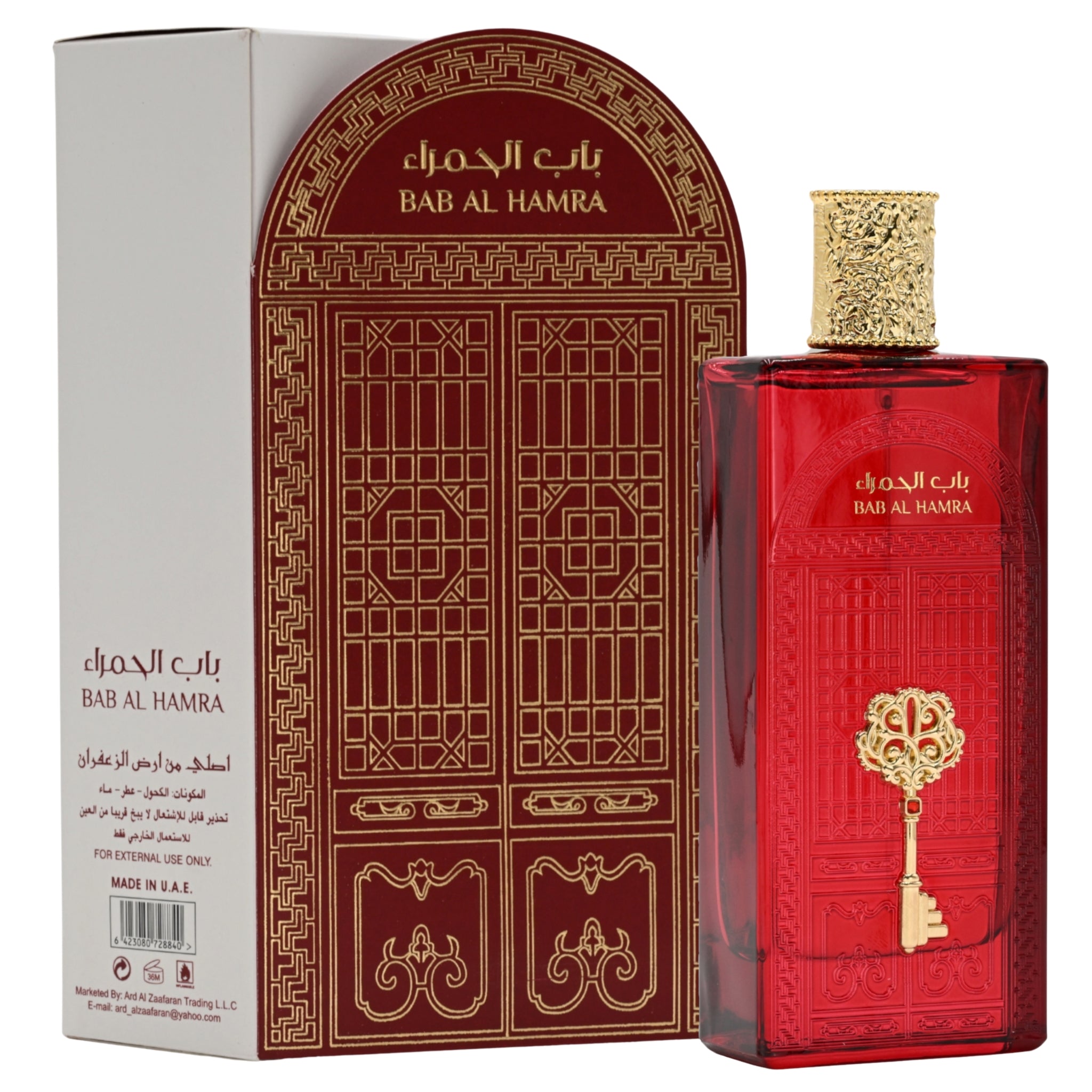 Red perfume bottle with gold accents and matching packaging on a white background