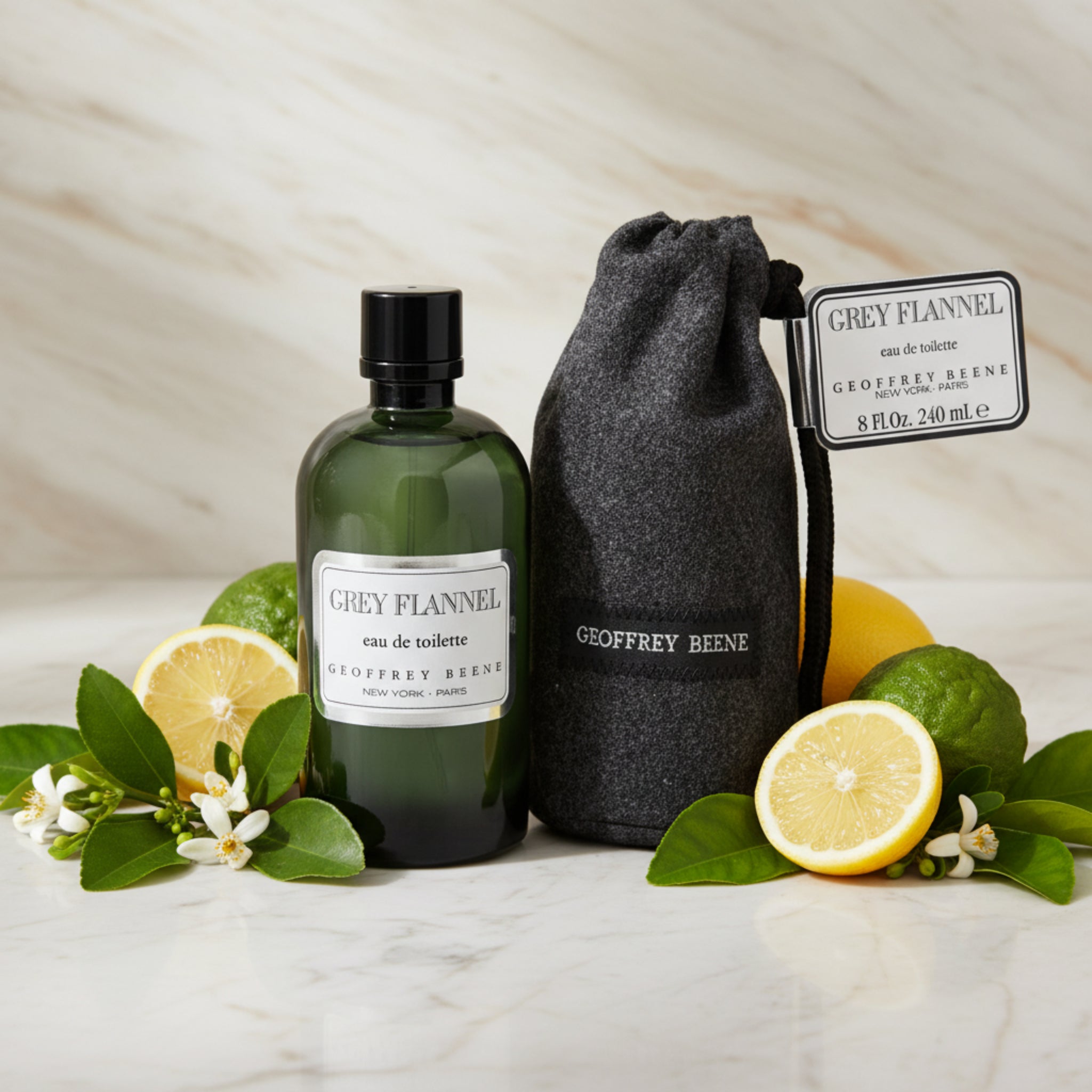 Geoffrey Beene Grey Flannel eau de toilette bottle with black pouch on a white background