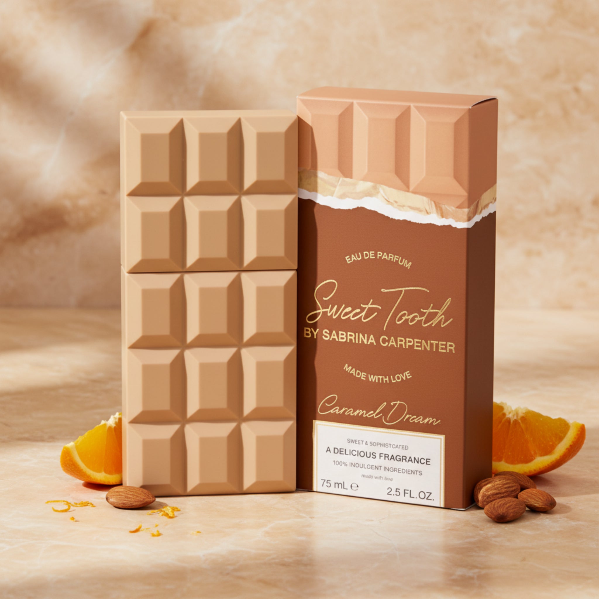 Chocolate bar-shaped perfume packaging with 'Sweet Tooth by Sabrina Carpenter' branding.