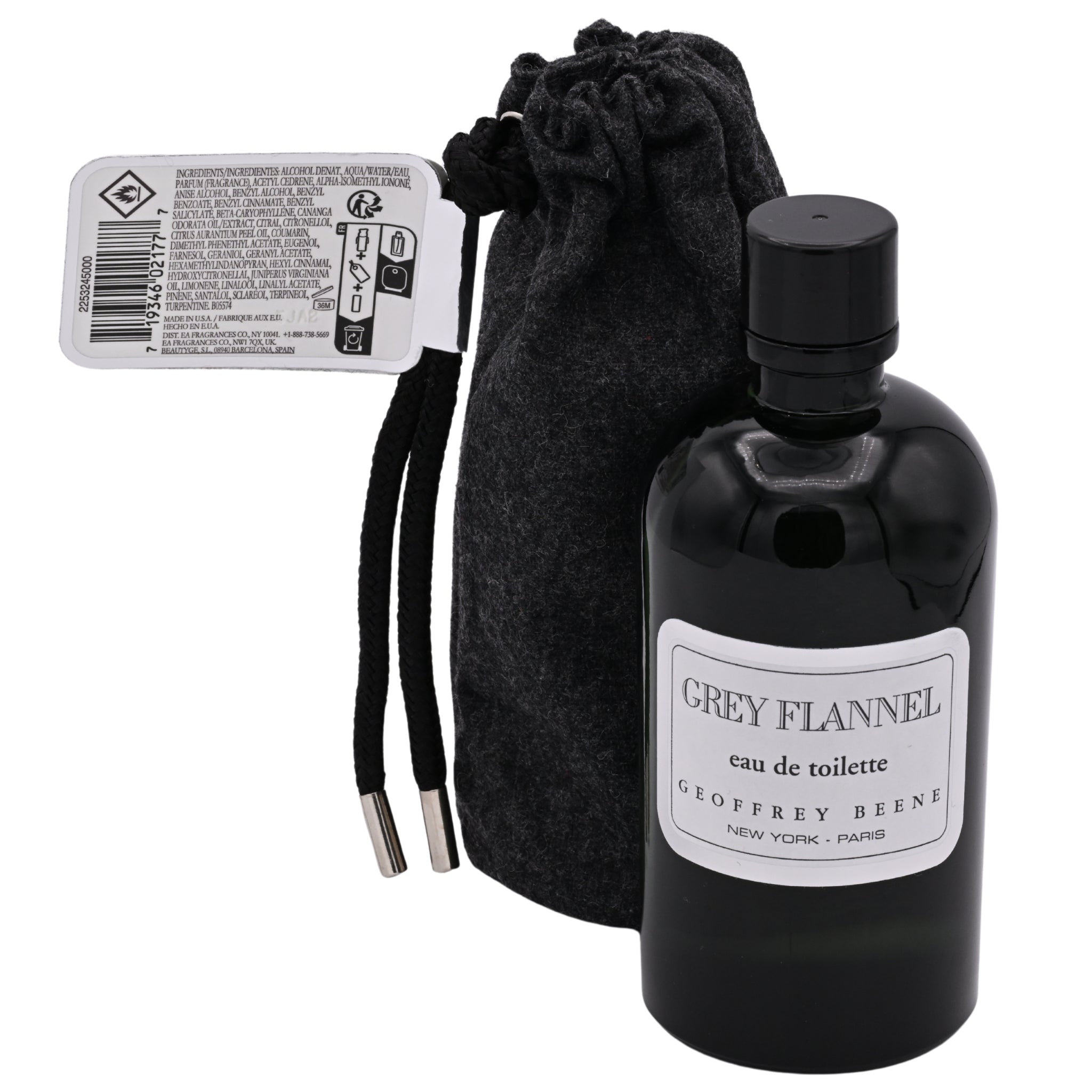 Black perfume bottle labeled 'Grey Flannel' by Geoffrey Beene with a black drawstring bag on a white background.