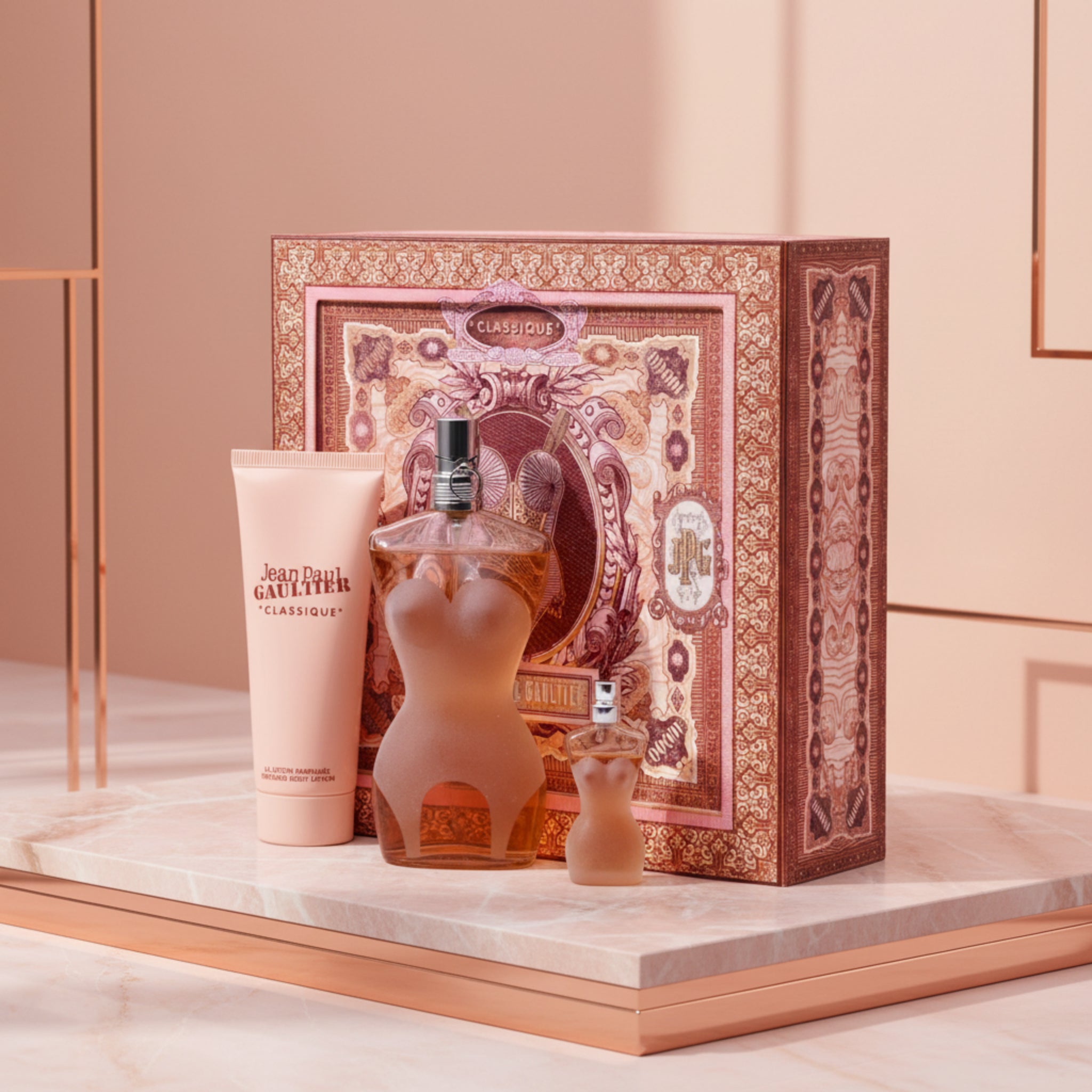 Jean Paul Gaultier Classique perfume set with decorative box, bottle, and tube.