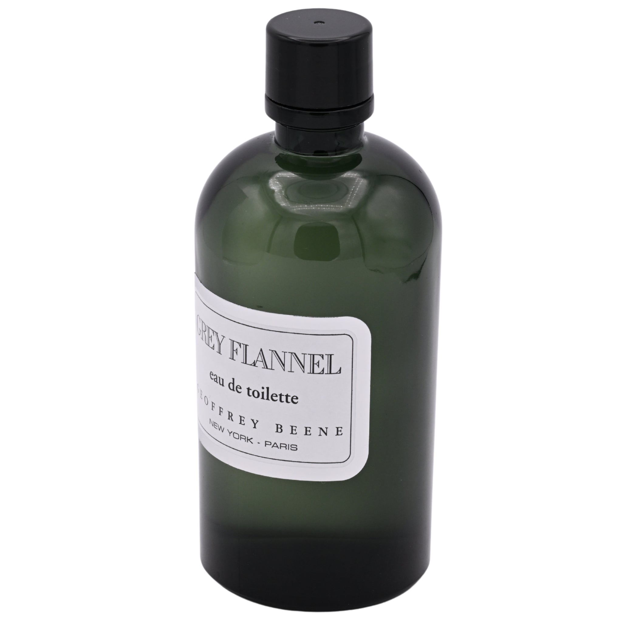 Green bottle of Geoffrey Beene Grey Flannel eau de toilette on a white background