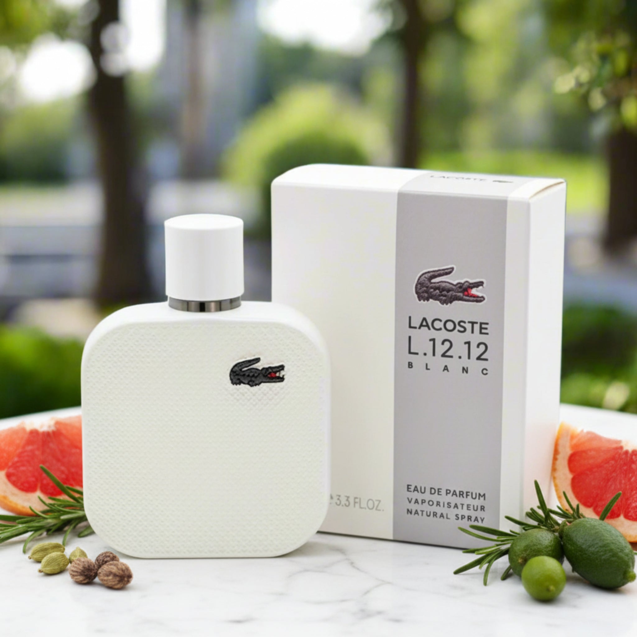 Lacoste L.12.12 Blanc perfume bottle and packaging on a reflective surface with blurred greenery in the background