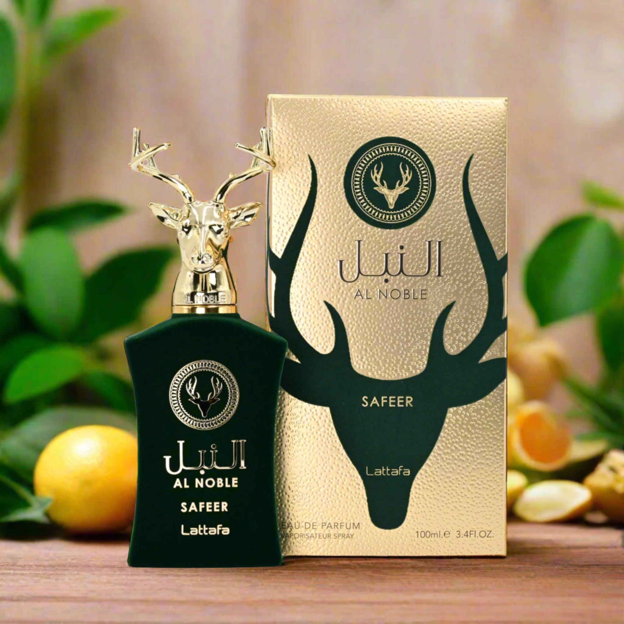 Green perfume bottle with gold deer head design and matching box on a wooden surface with plants in the background
