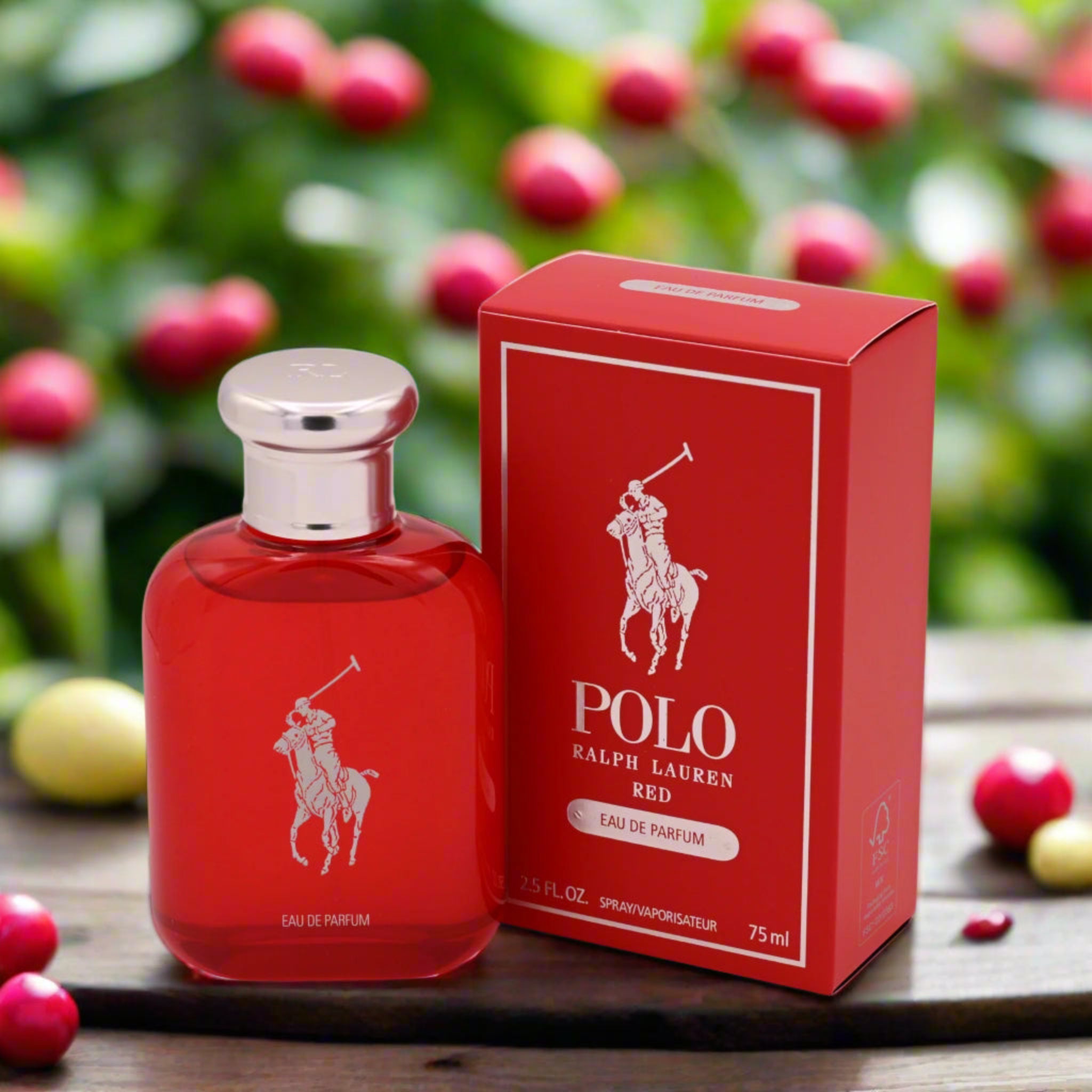 Red Polo Ralph Lauren perfume bottle and packaging with berries in the background