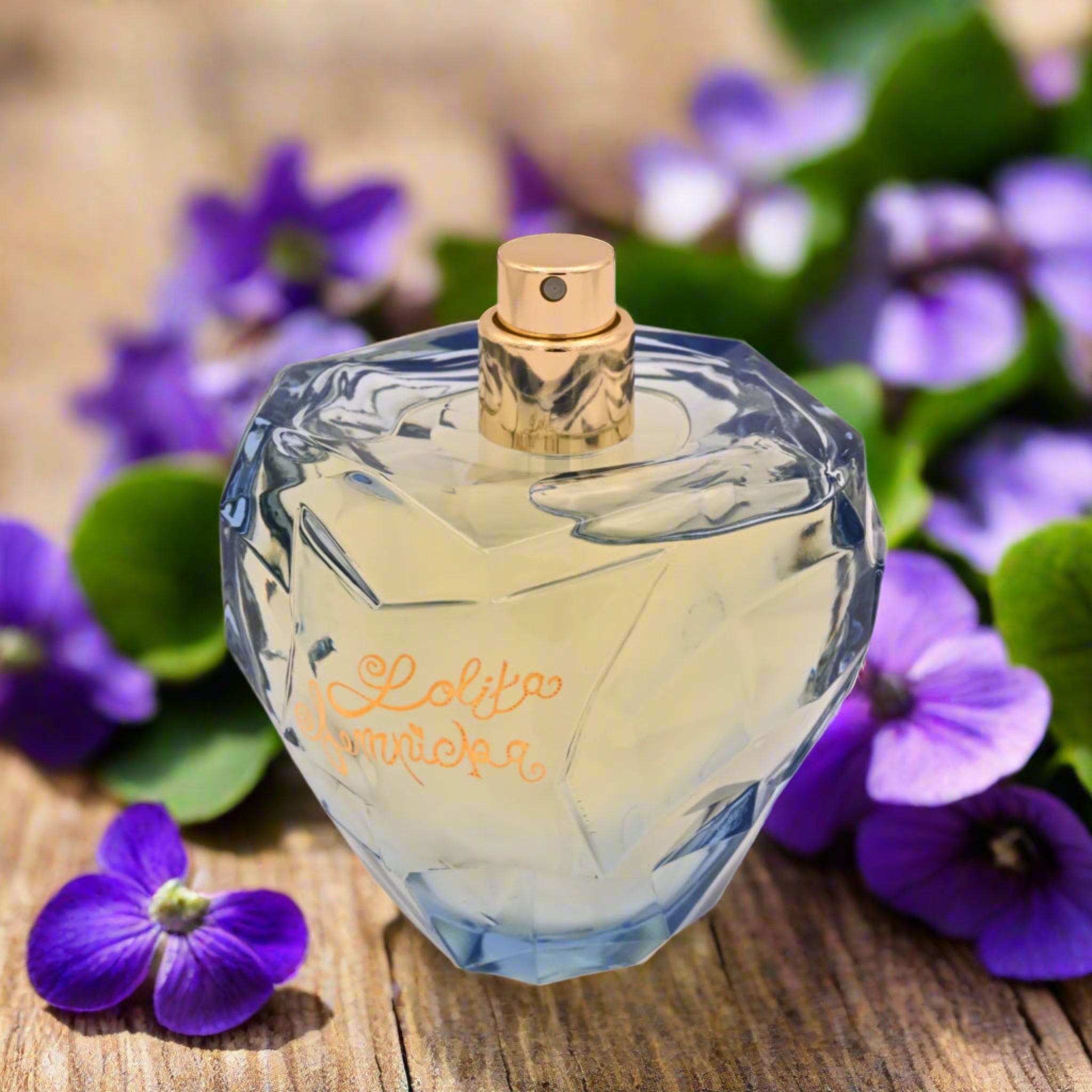 Perfume bottle with gold cap on a white background
