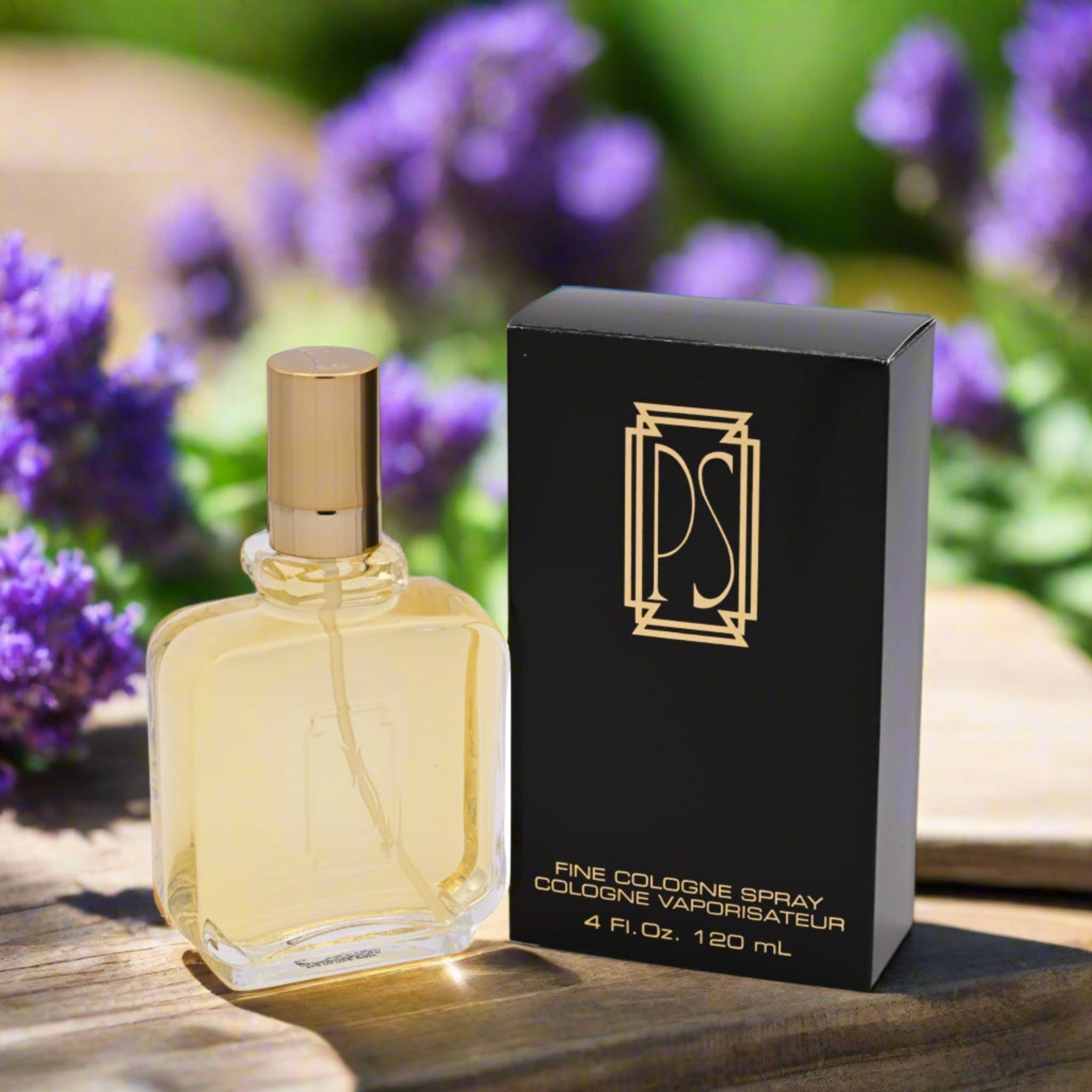 Perfume bottle with gold cap and black box featuring 'PS' logo on a white background