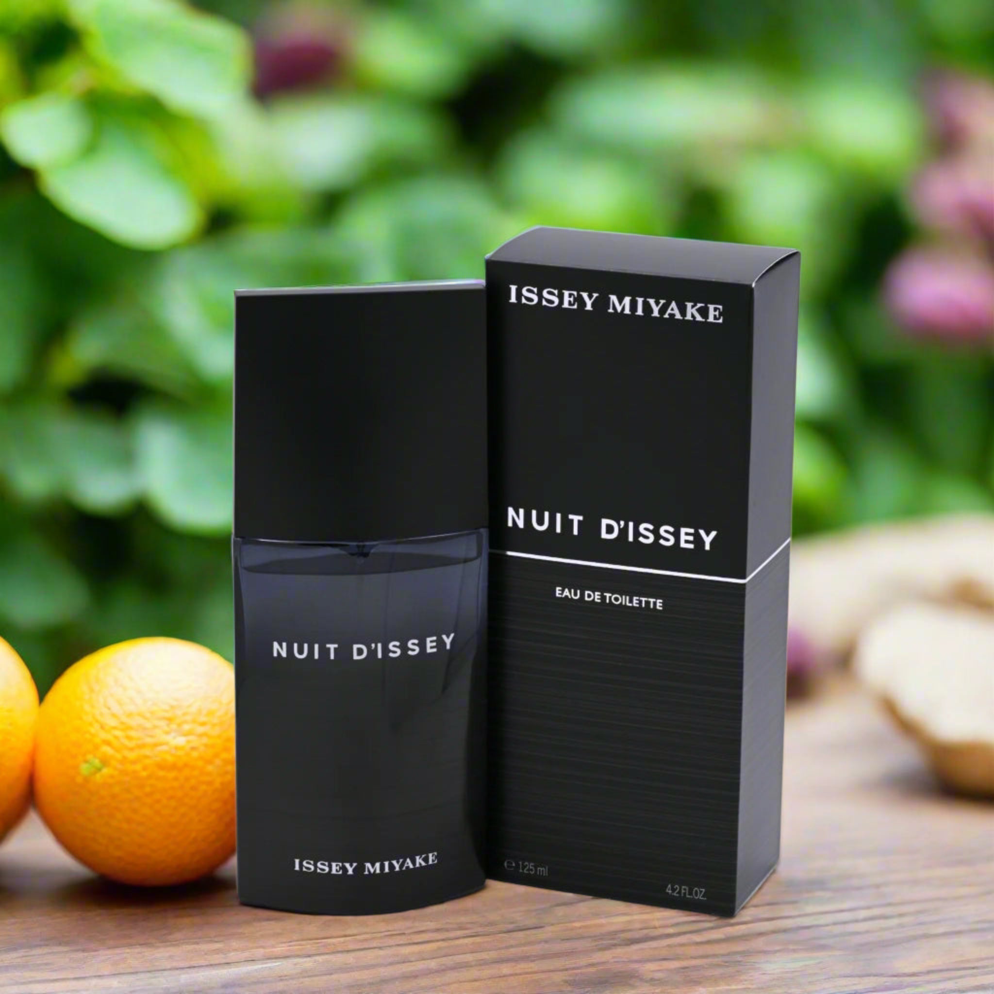 Issey Miyake Nuit D'Issey perfume bottle and packaging on a white background