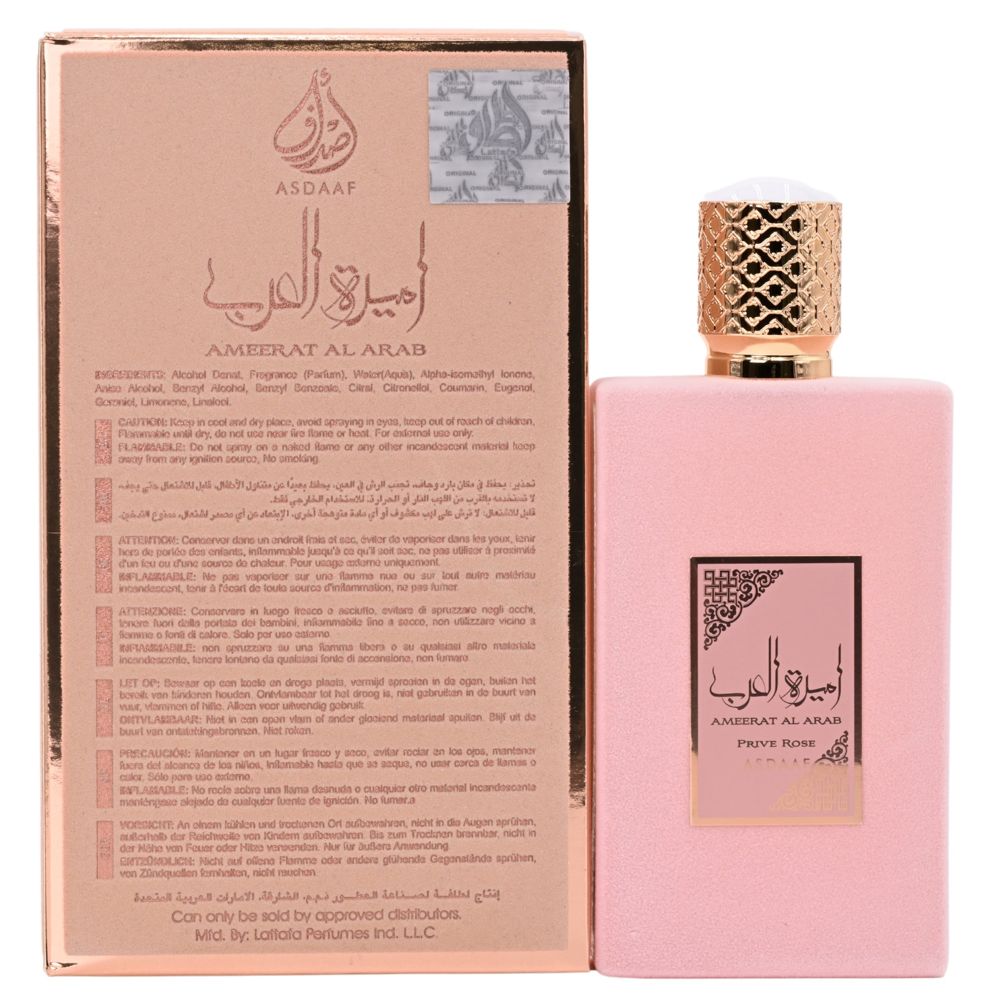 Pink perfume bottle with gold cap and decorative packaging on a white background