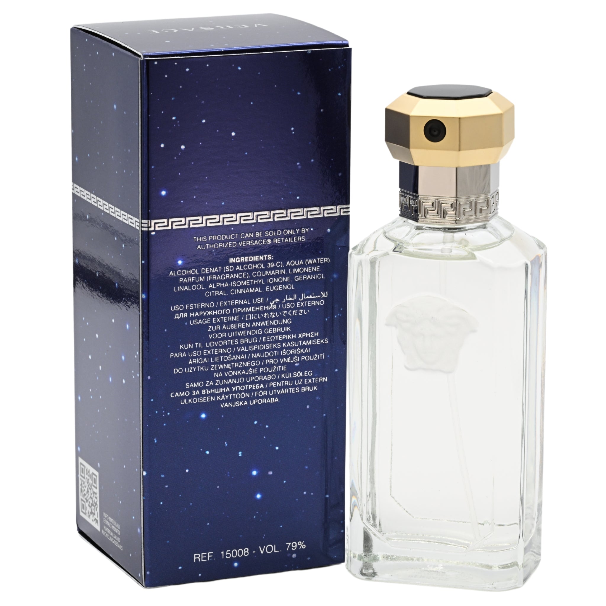 Perfume bottle with gold cap and clear glass design next to its packaging on a white background