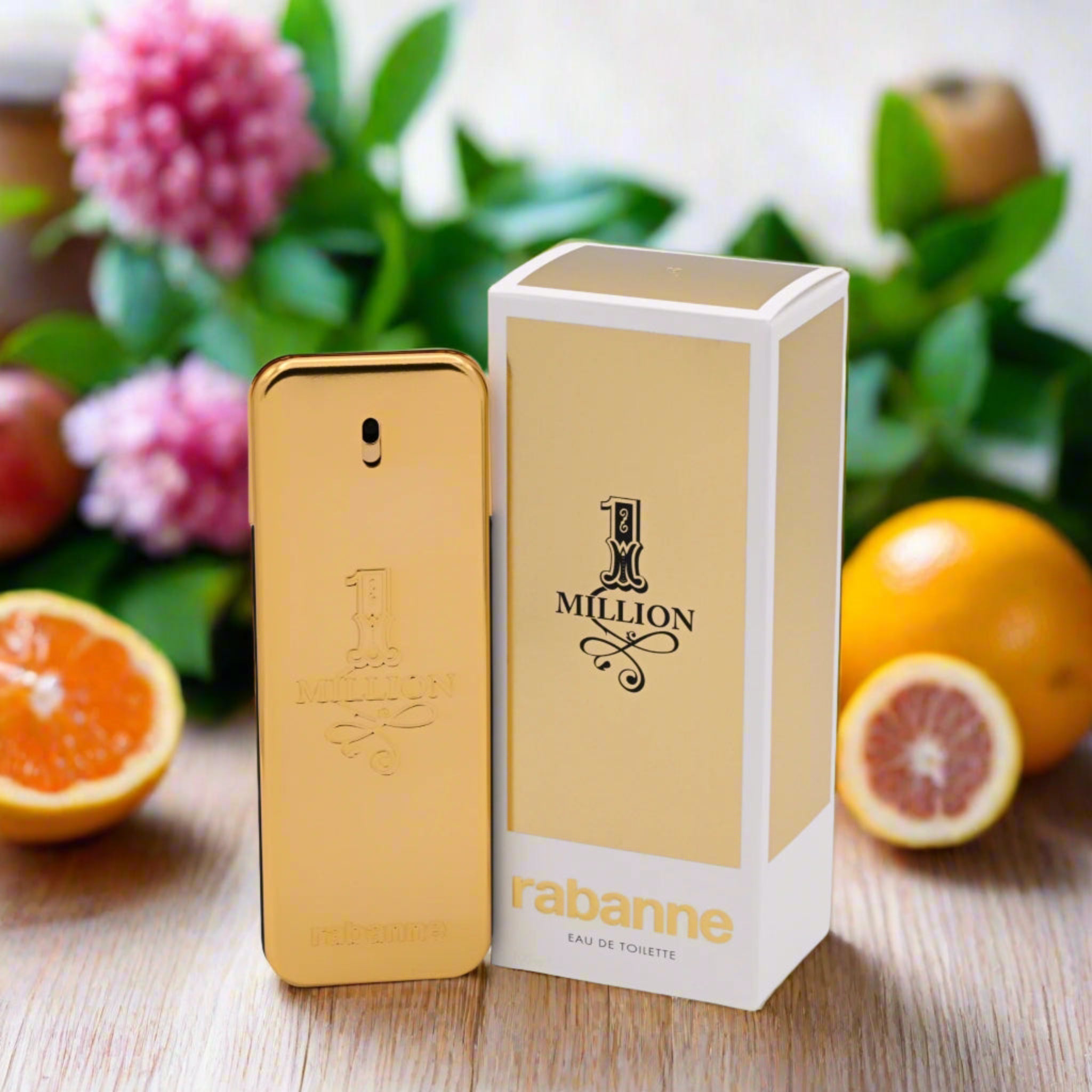 Rabanne 1 Million perfume bottle and packaging with fruits and flowers in the background