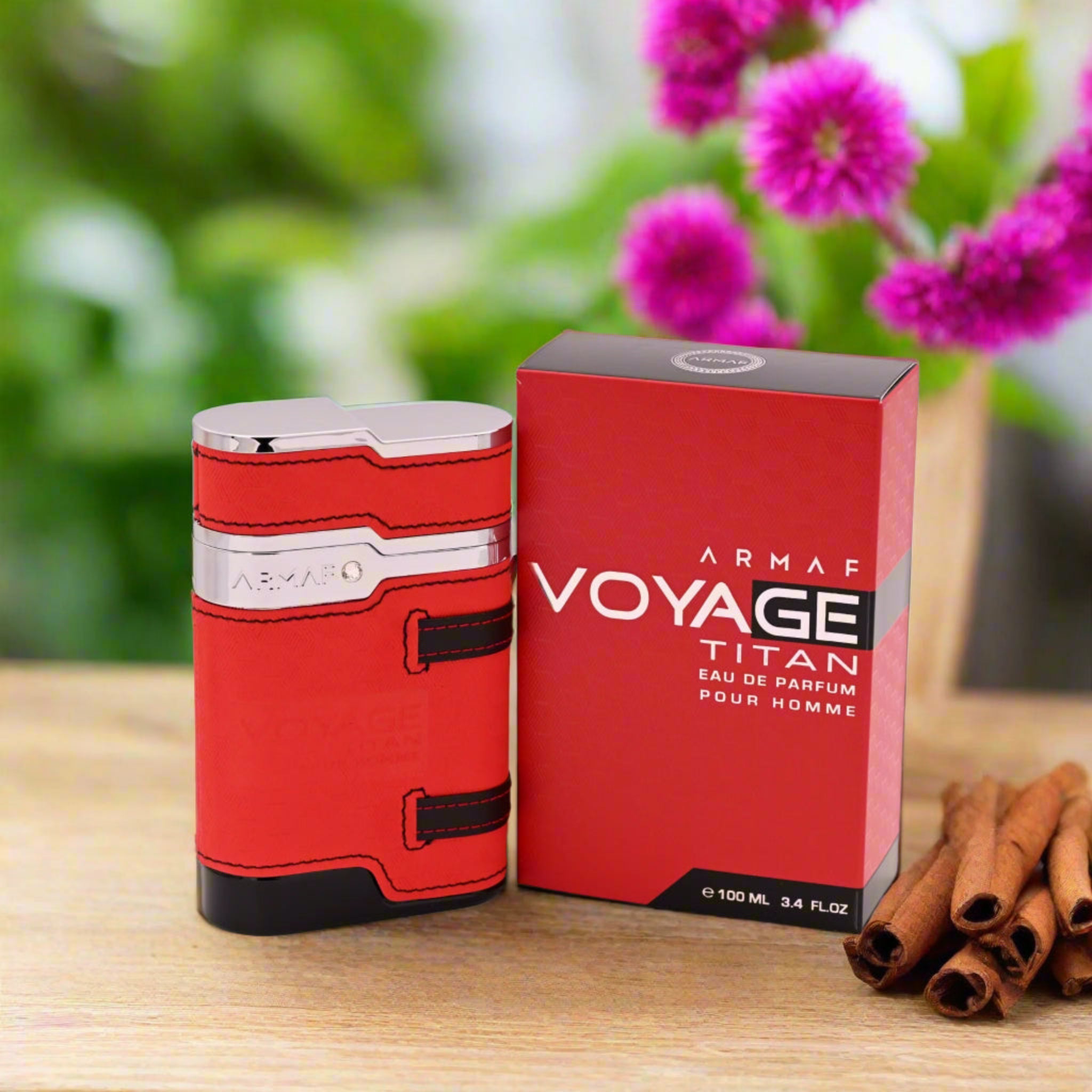 Red Armaf Voyage Titan perfume bottle with packaging on a white background