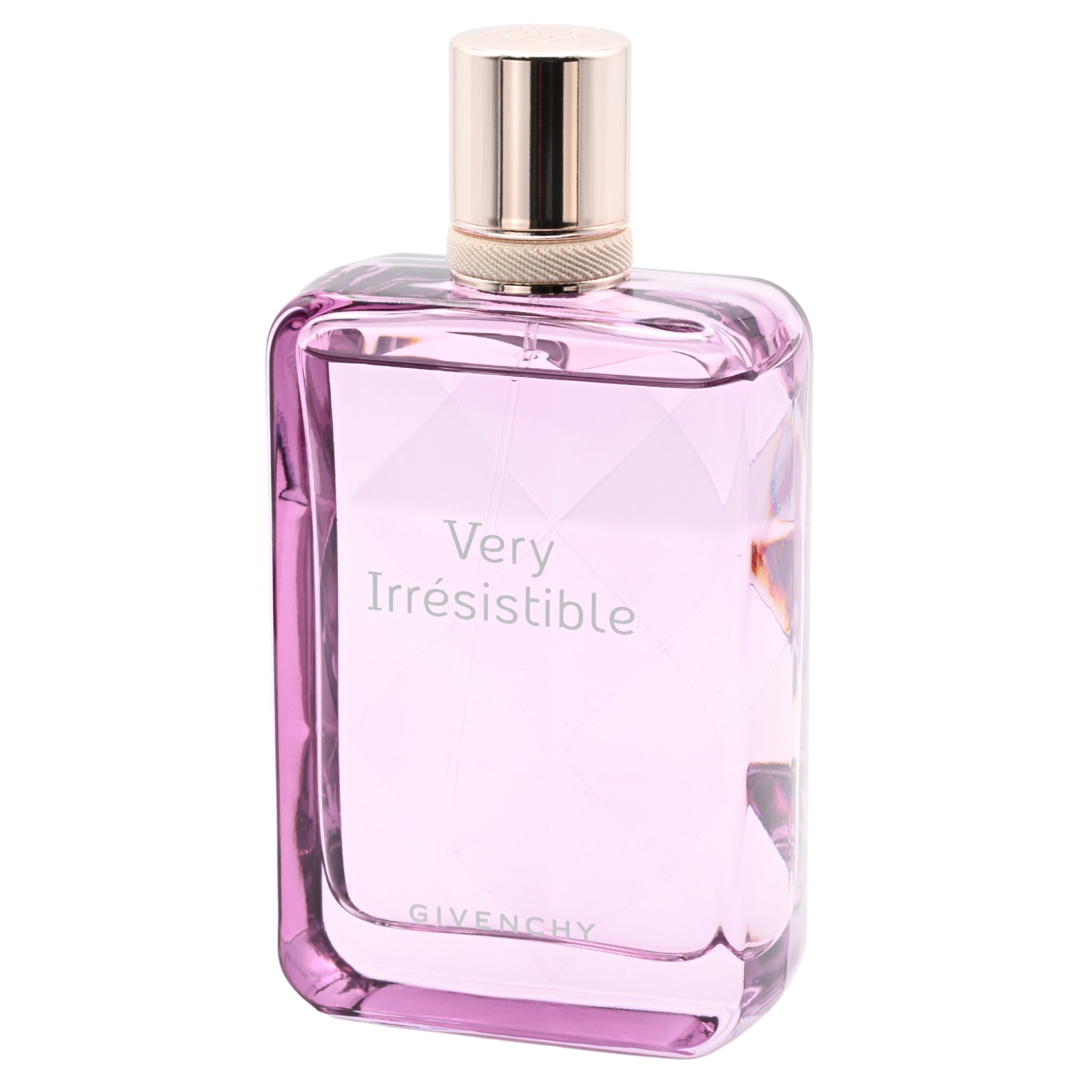 Pink Givenchy perfume bottle labeled 'Very Irresistible' on a white background
