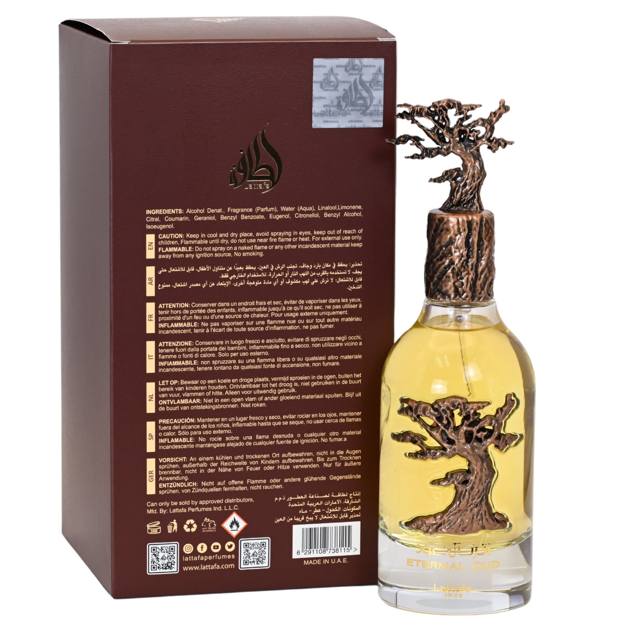 Bottle of perfume with tree design and packaging on a white background