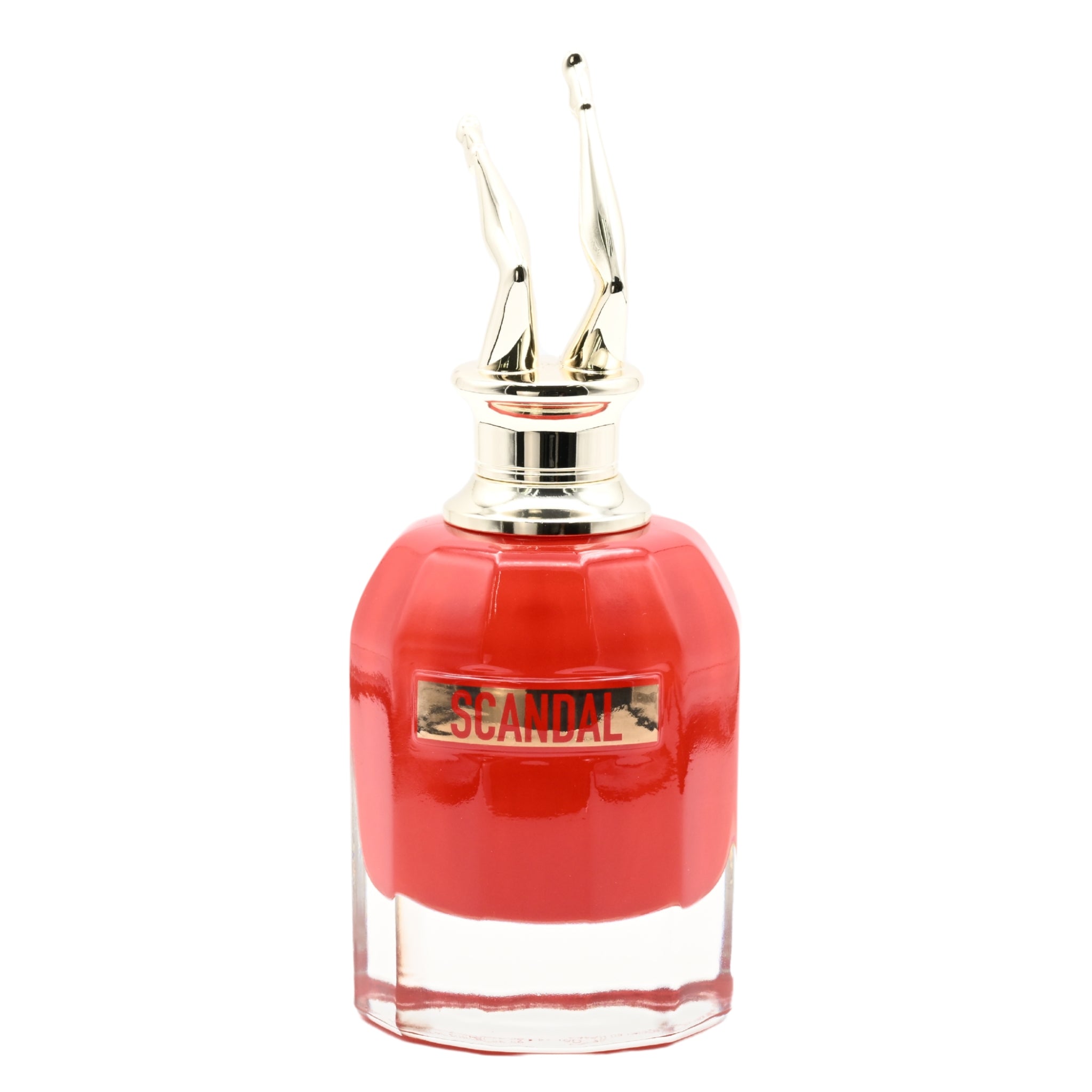 Red perfume bottle with gold cap on a white background