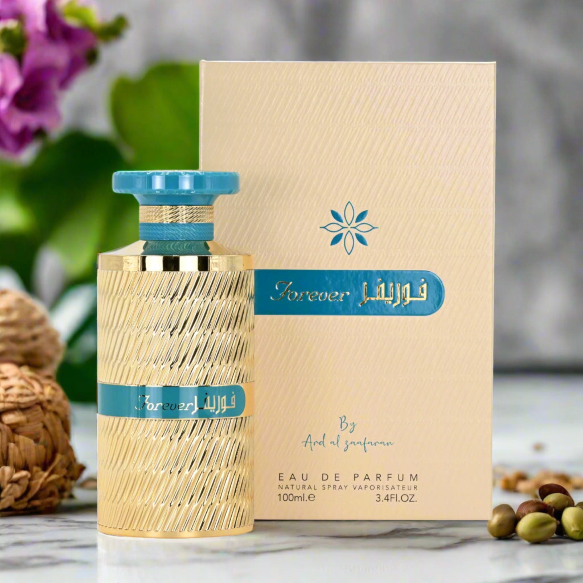 Eau de Parfum bottle with packaging on a marble surface with decorative elements.